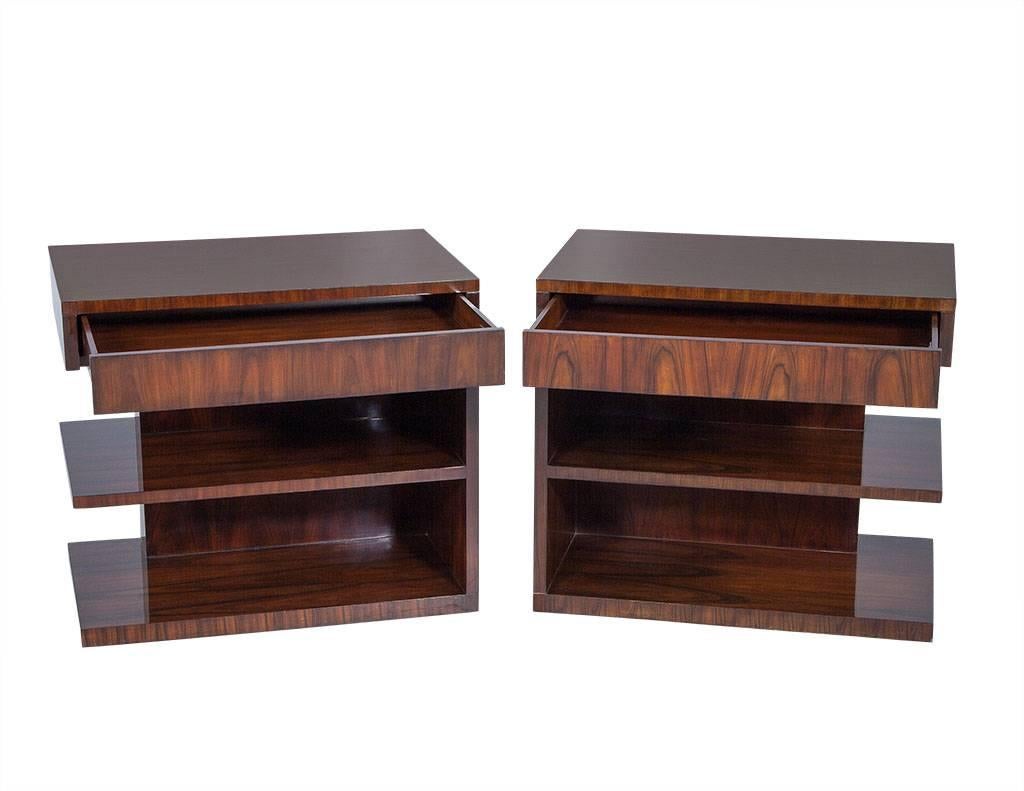 Stunning nightstands with clean linear design that makes for a timeless style. The stands are finished in a rich Hollywood dark walnut with a high gloss finish. 

Please note, bed is sold separately.