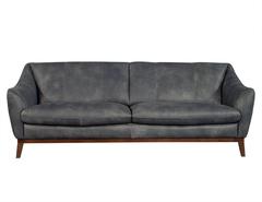Canapé en cuir vieilli matelassé en gris