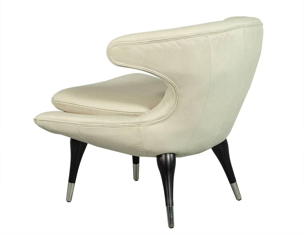 Pair of Cream Leather Retro Style Lounge Chairs In Excellent Condition In North York, ON