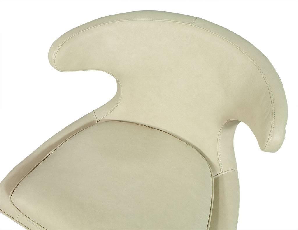 Contemporary Pair of Cream Leather Retro Style Lounge Chairs