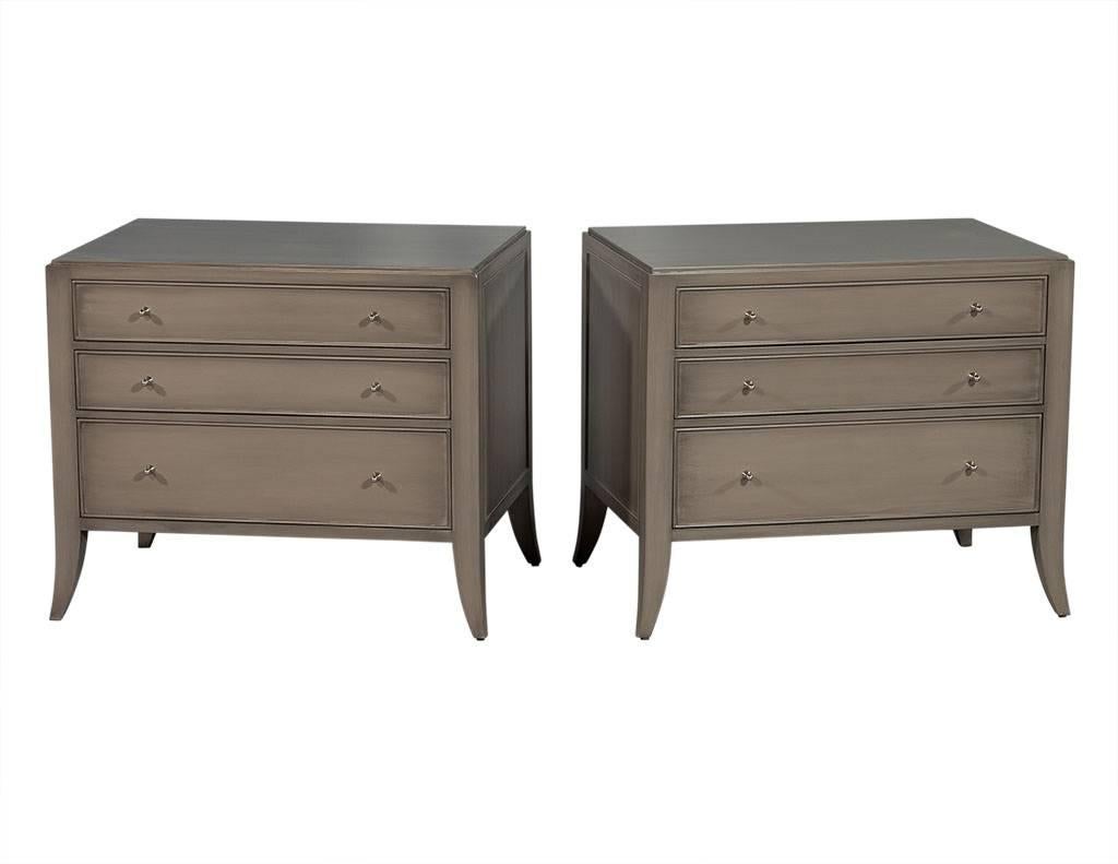 These modern chests are absolutely fabulous. Designed by Barbara Barry for Baker Furniture, these small storage chests are finished in a beautiful yet neutral taupe/grey with three drawers and chrome drawer knobs to complete the look. A perfect fit