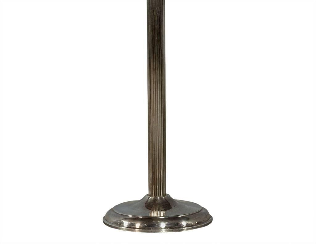 This original wine or champagne cooler is a cool addition to any home. Perfect for entertaining, the stamped silver plate bowl sits atop a grooved column creating contrast and adding to the functionality of the unique piece.