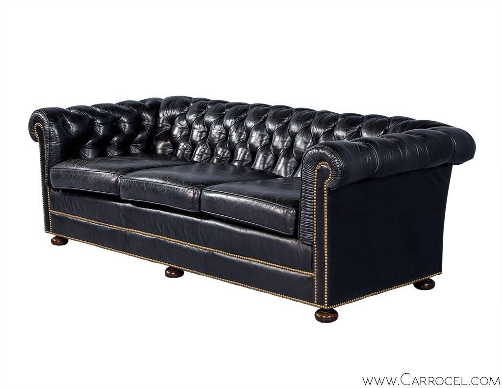 distressed black leather couch