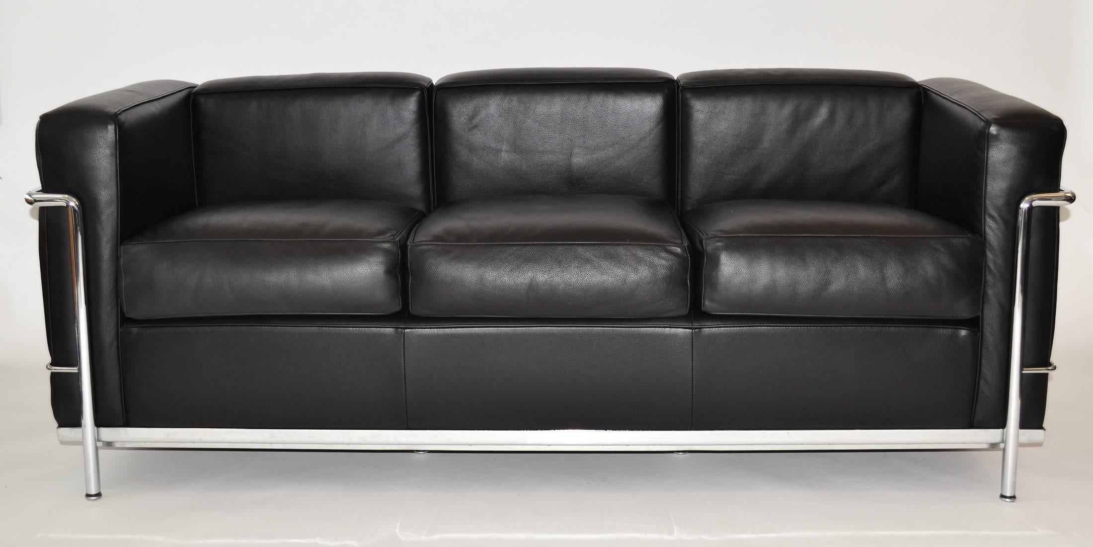 Classic LC2 three-seat leather sofa designed in 1928 by Le Corbusier, produced by Cassina, circa 1980s. Frame is trivalent chrome-plated steel. Upholstered in full-grain Italian leather. A fine example. Labeled.
      