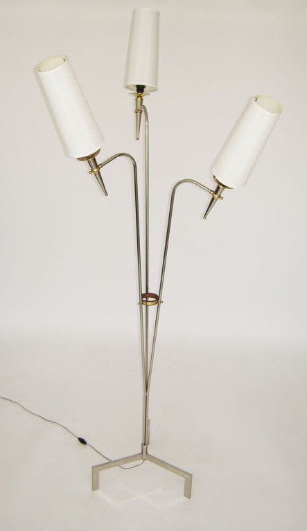 Three-arm floor lamp fabulous French design. Midcentury French floor lamp with three curving arms supporting conical stems on three feet. Mixed metal finishes and details. Original attached silk shades. After or in the style of Sarfatti, Arteluce,