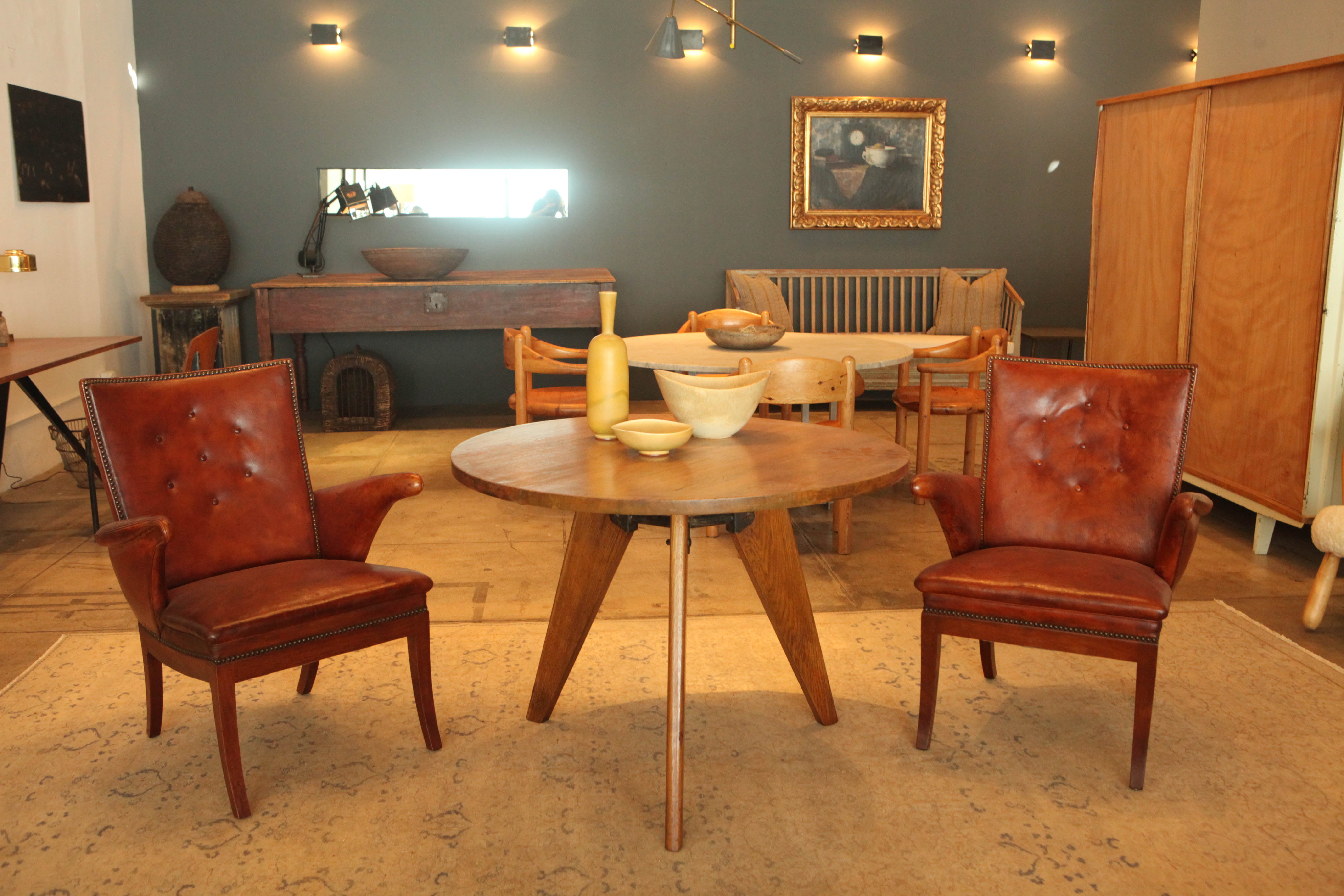 A pair of deep cognac armchairs by Frits Henningsen in original condition.
Sold only as a pair.
              