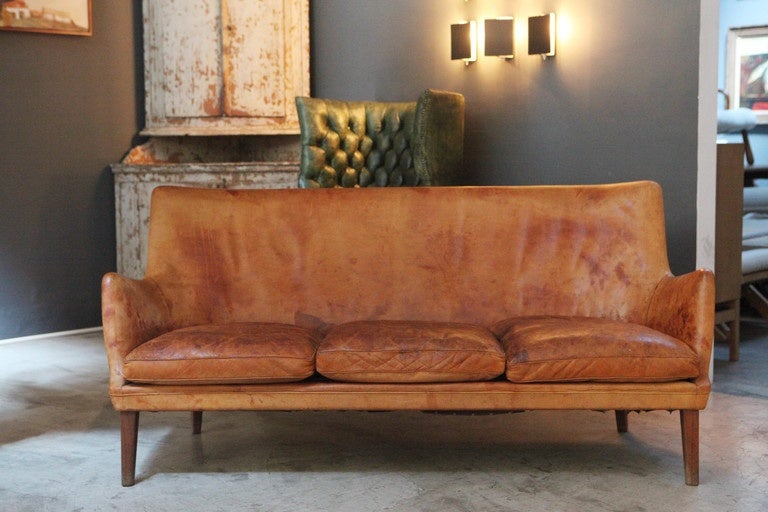 A beautifully patinated Arne Vodder three-seat with rosewood frame, produced for Arne Vodder by Ivan Schlechter.