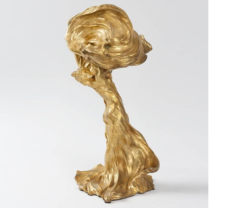 French Art Nouveau gilt bronze lighted sculpture, “Loïe Fuller,” designed and sculpted by Raoul Larche, circa 1893–1905. This is the most famous of all bronzes to be made in the Art Nouveau aesthetic. Here, Larche represents the famous American