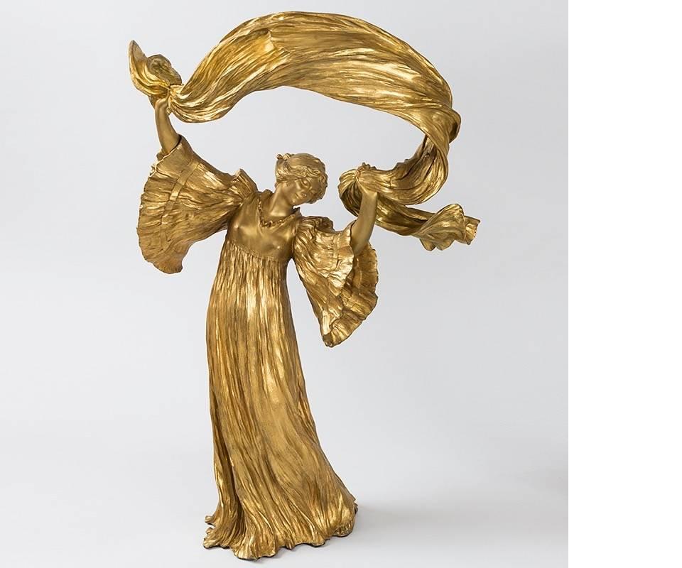 Paire de sculptures en bronze doré Art Nouveau 