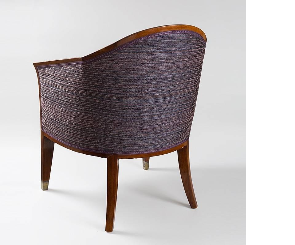 A pair of rosewood and brass accented Art Deco armchairs by Dominique. 

Similar chairs are pictured in: Art Deco Furniture, by Alastair Duncan, New York: Holt, Rinehart and Winston, 1984, illustration 45. 


(MG #18214)