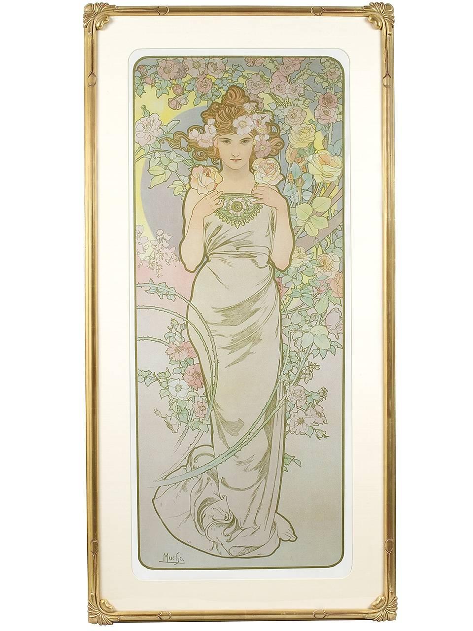 A set of four "Les fleurs" French Art Nouveau lithographs by Alphonse Mucha, printed by F. Champenois, Paris. Each lithograph depicts a different flower; carnation, lily, rose & iris. These four separate lithographs are an original