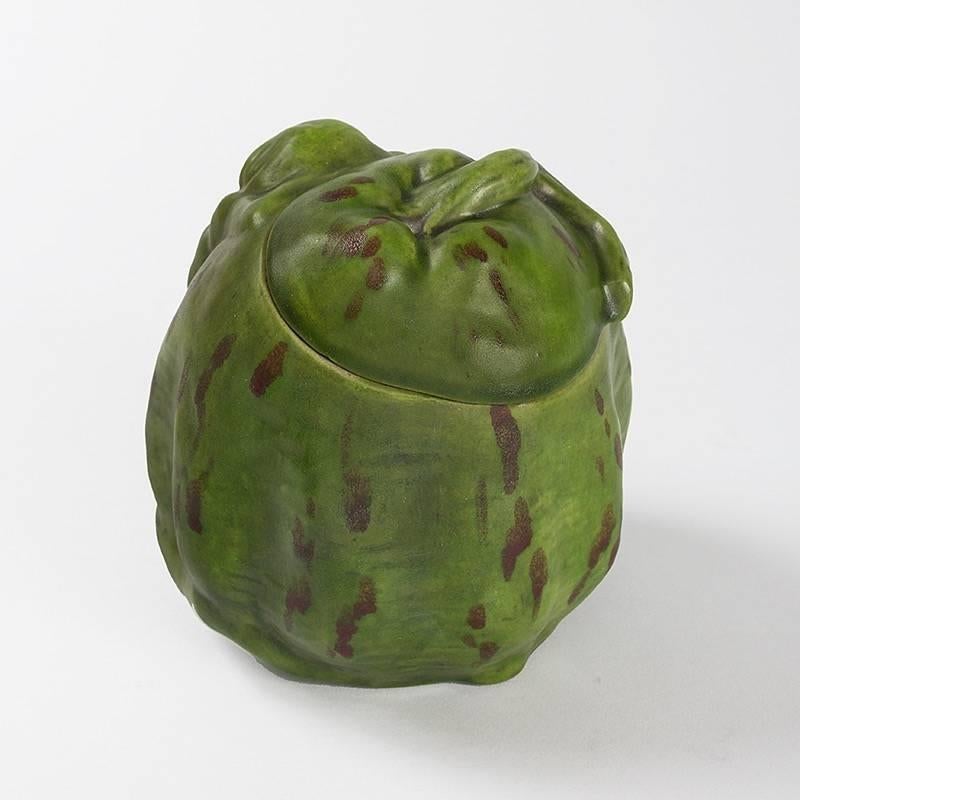 A French Art Nouveau ceramic covered jar by Rupert Carabin, depicting a female nude wrapped around a gourd form, with a deep green glaze. All of Carabin’s ceramic work was done by his own hand. This piece was made by Moulines, 20, rue Laffite.