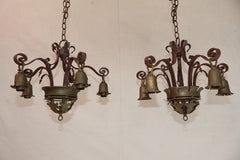 Pair of 1920's wrought iron/brass chandeliers