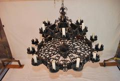 Rare and Impressive Large Pair of Wrought Iron and Wood 18 Lights Chandeliers