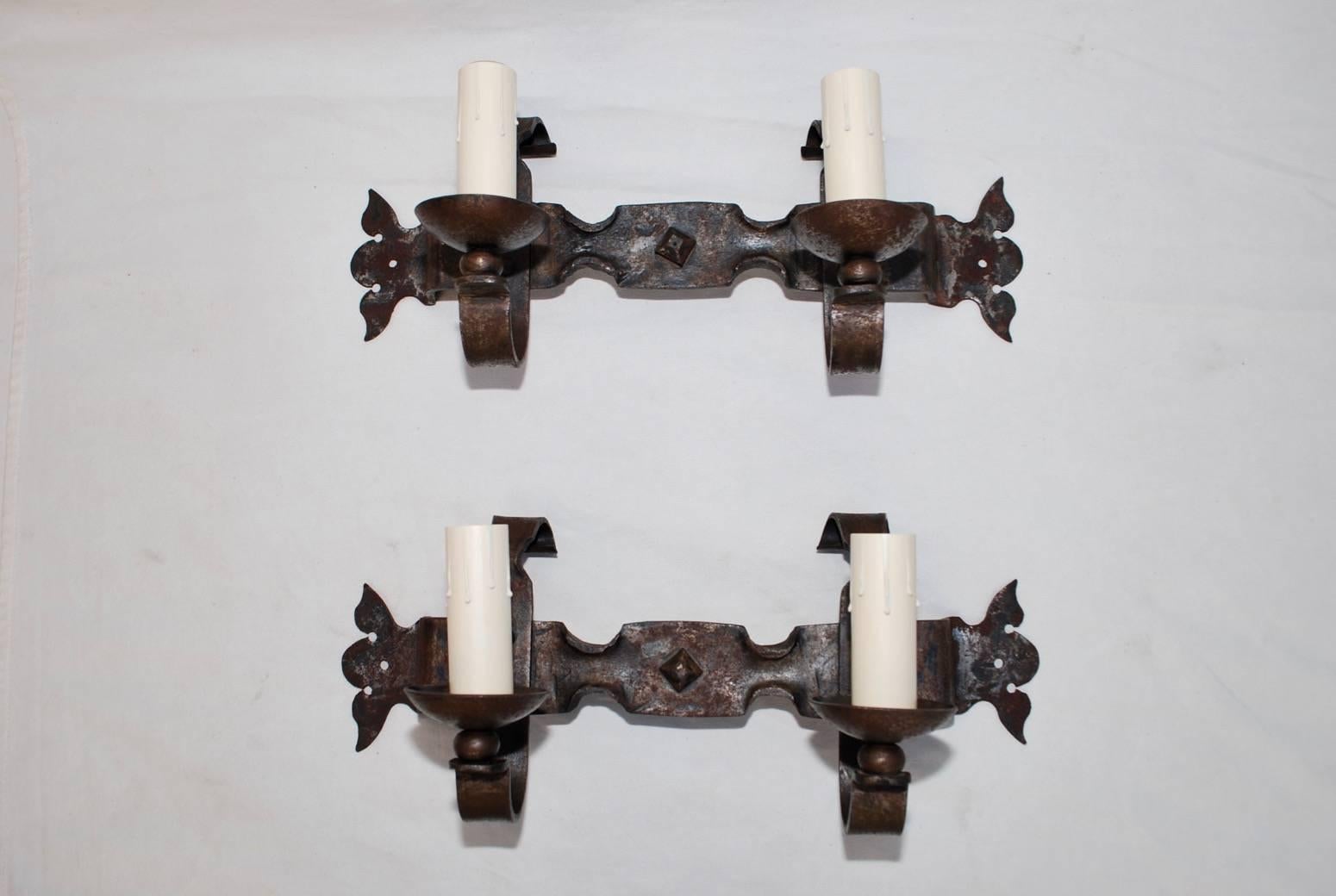 We have over three thousand antique sconces and over one thousand antique lights, if you need a specific pair of sconces or lights use the “Contact Dealer” button to ask us, we might have it in our store
We also have our own line of wrought iron