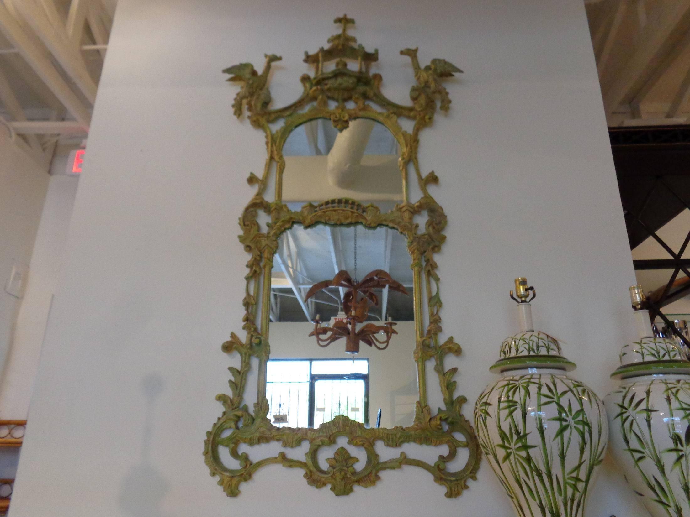 Hollywood Regency Chippendale style mirror in nice as found vintage condition. There are scuffs and scrapes to the as found finish.