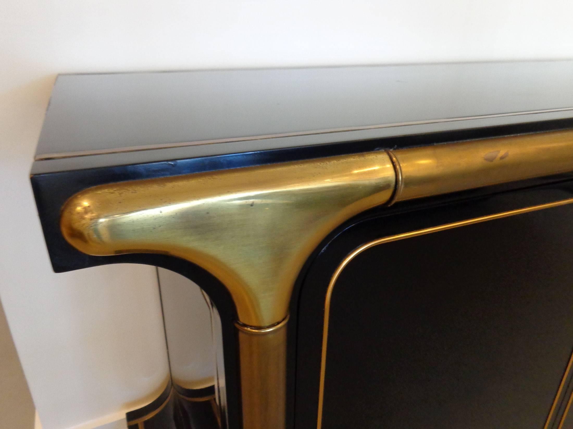 Lacquered Mastercraft credenza with brass details in nice as found vintage condition.