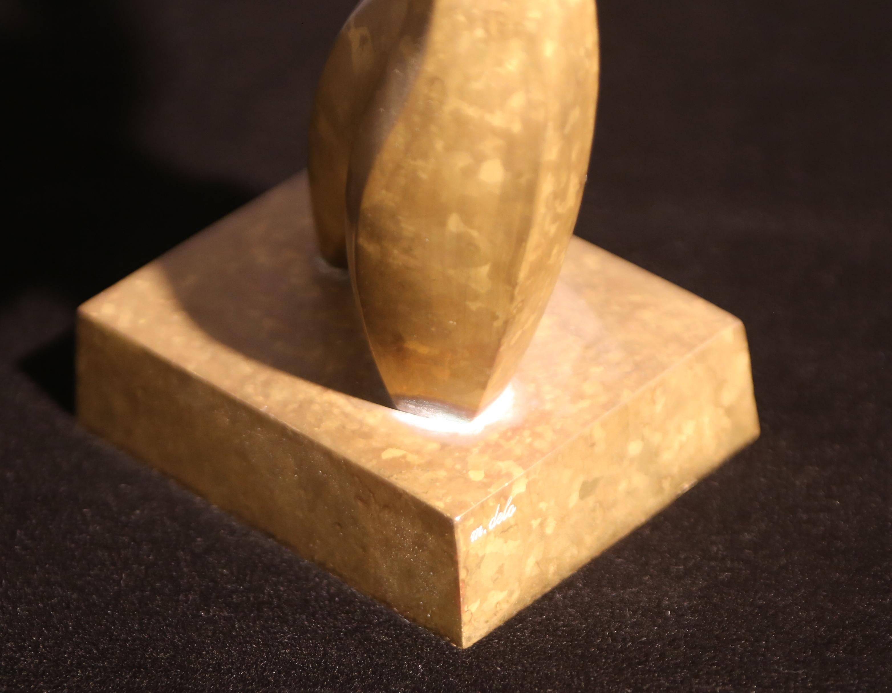 Maxime Delo.
Brass sculpture depicting Man 