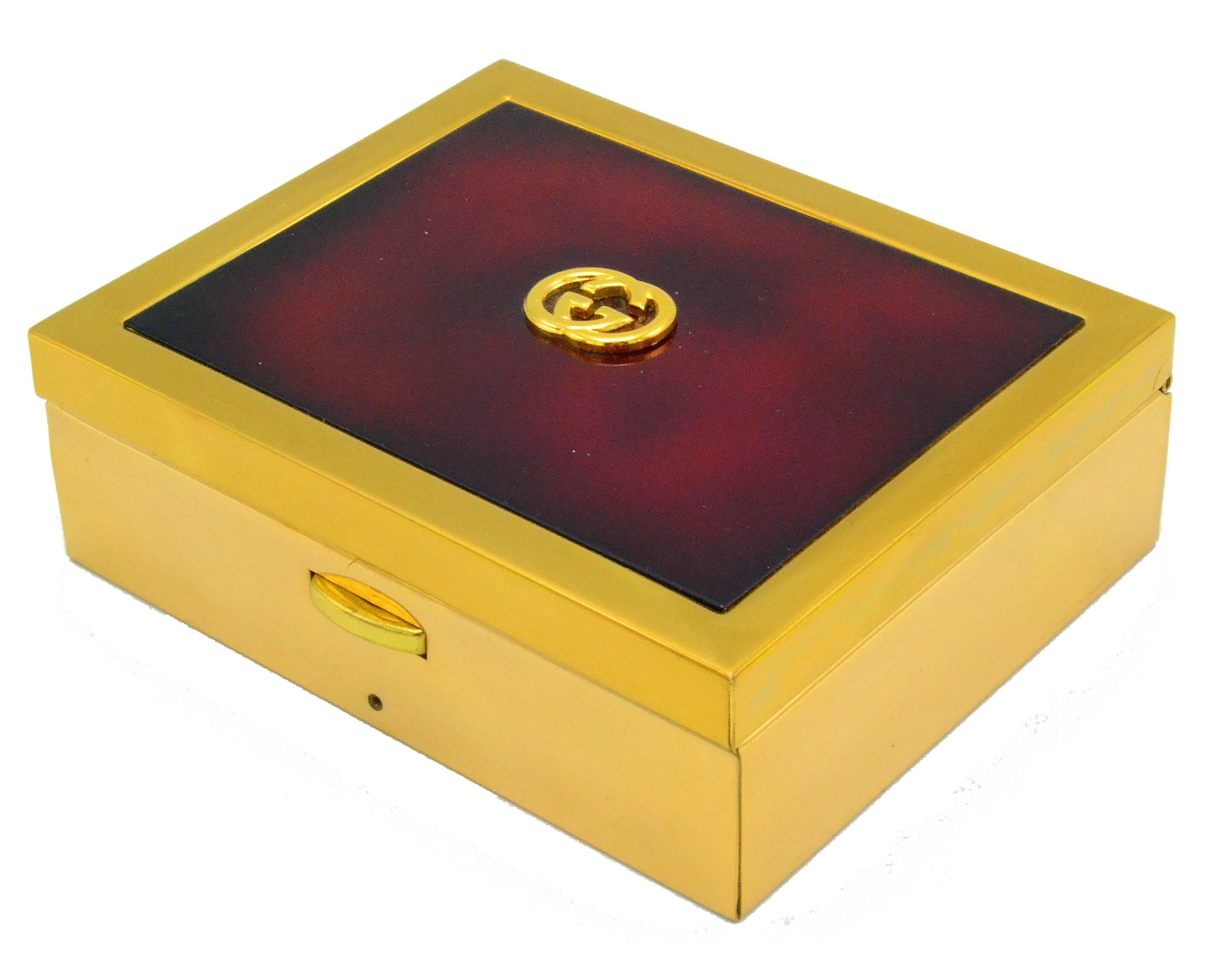 Gucci box made out of brass and wood.
Marked inside with Gucci Italy.