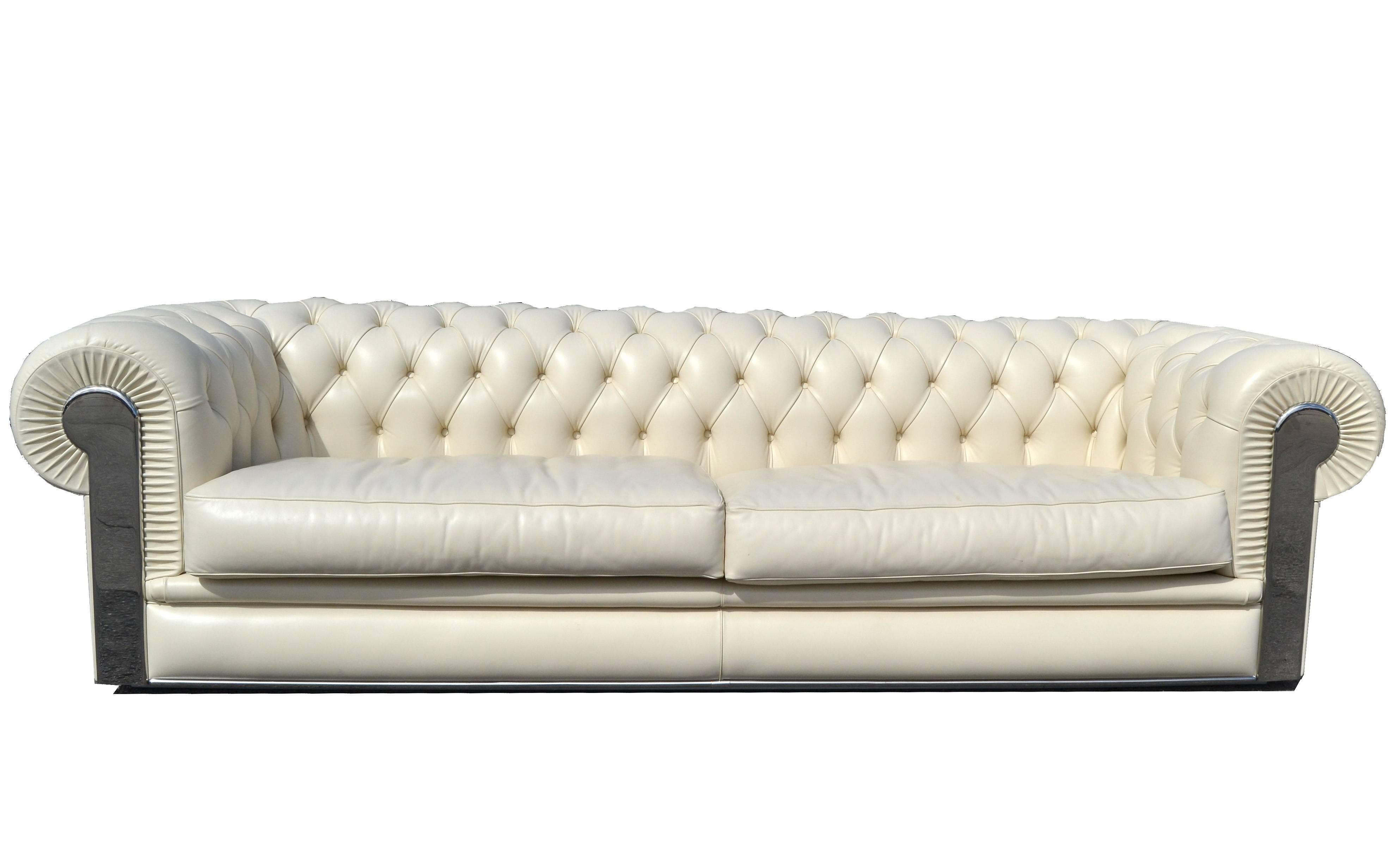 Original Fendi tufted Albino leather sofa in Chesterfield style.
The arms have chrome inlays and it comes with two cushions.
Fendi Casa mark is imprinted in the fabric.
The leather is very soft and in excellent condition.
Measure: Seat height