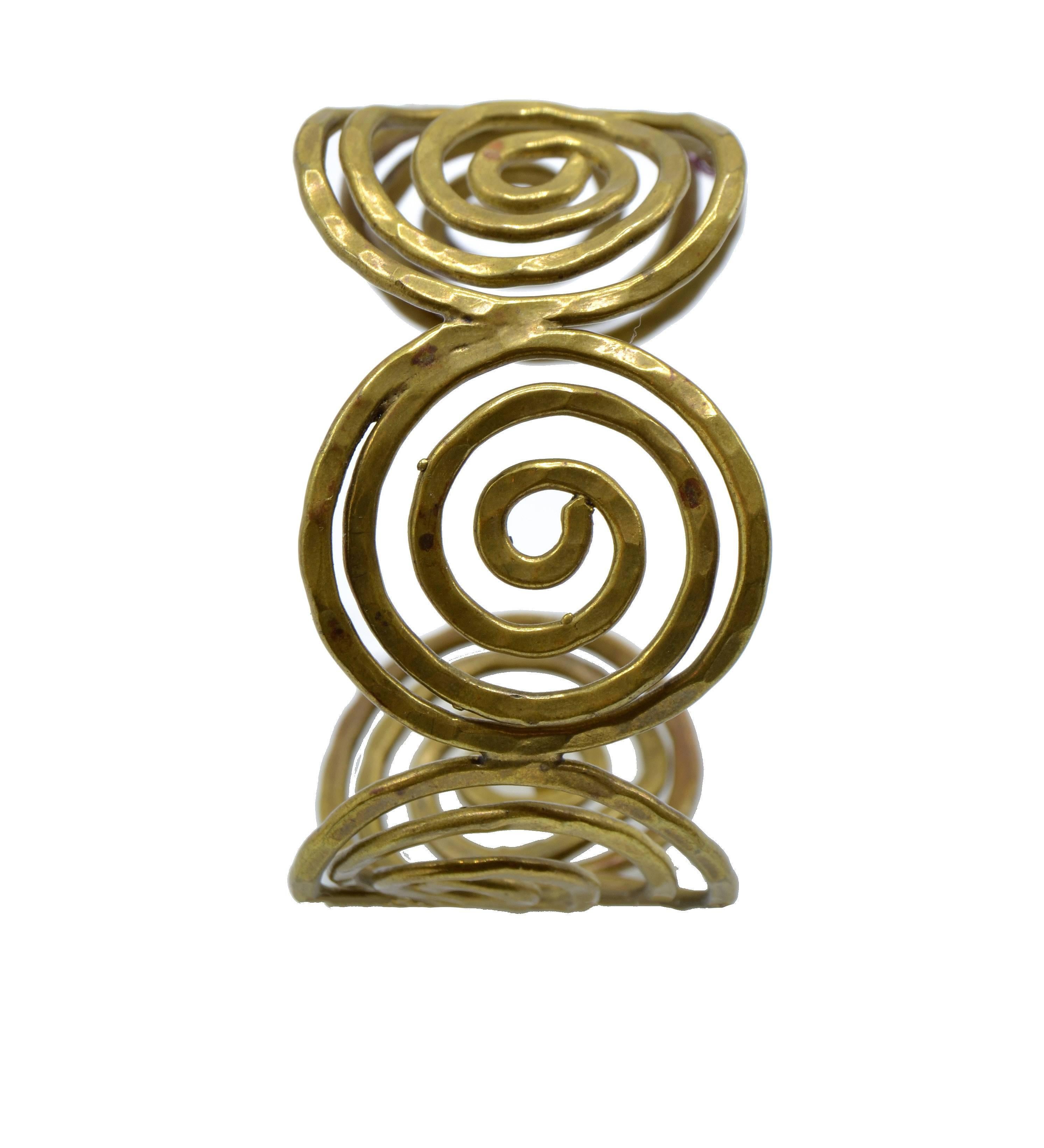 Greek key style cuff made out of brass.
Stunning piece of art.