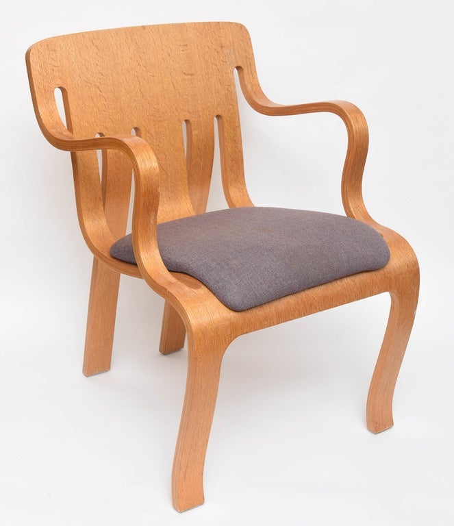 Pair of Thonet arm chairs in bent plywood.