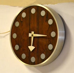 1970s Howard Miller Wall Clock designed by Arthur Umanoff Zebra Wood & Chrome