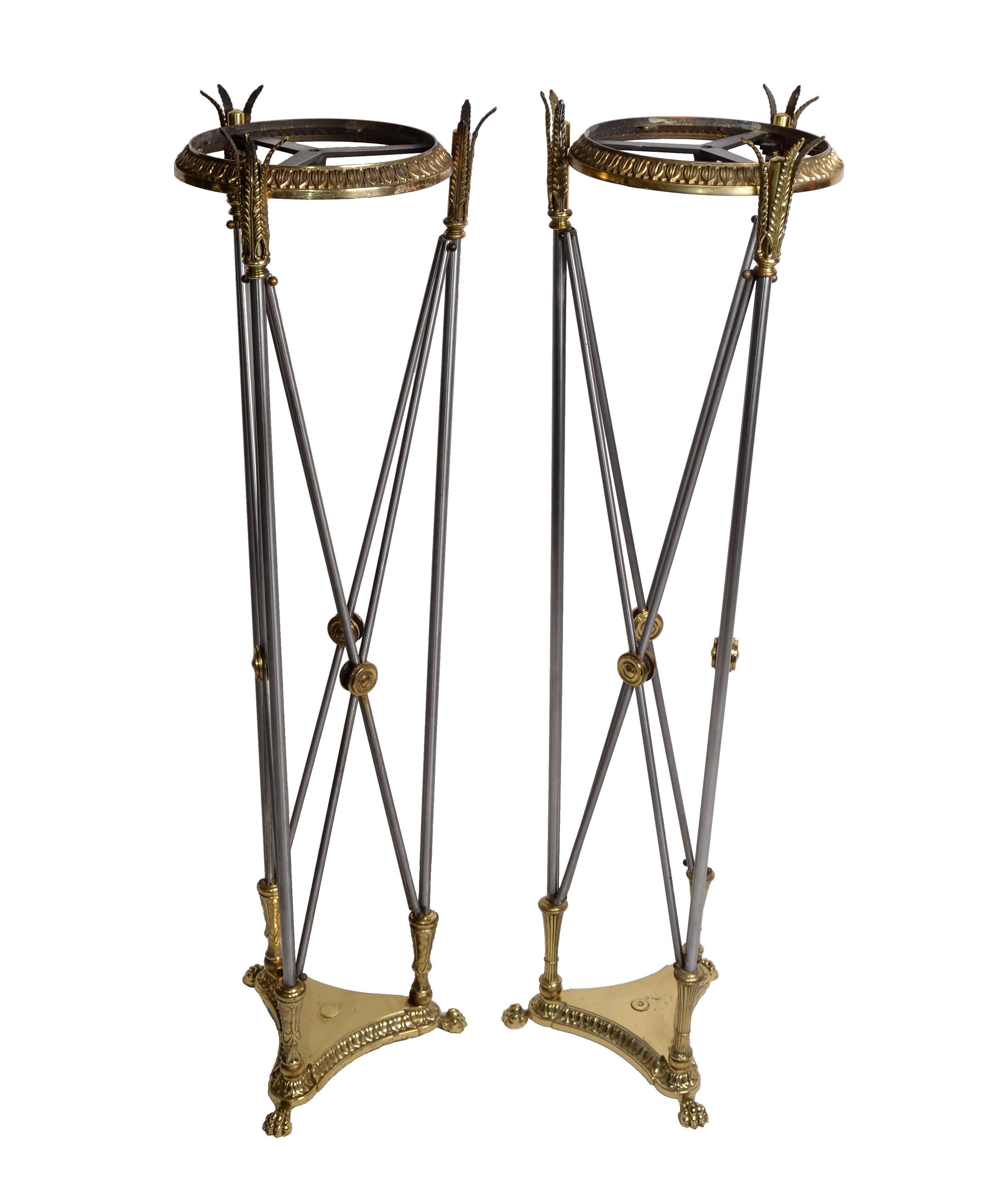 Hollywood Regency Maison Jansen Style planter stand/pedestal, a pair.
Beautifully crafted with brass and steel.
Very detailed bases with claw feet.
   