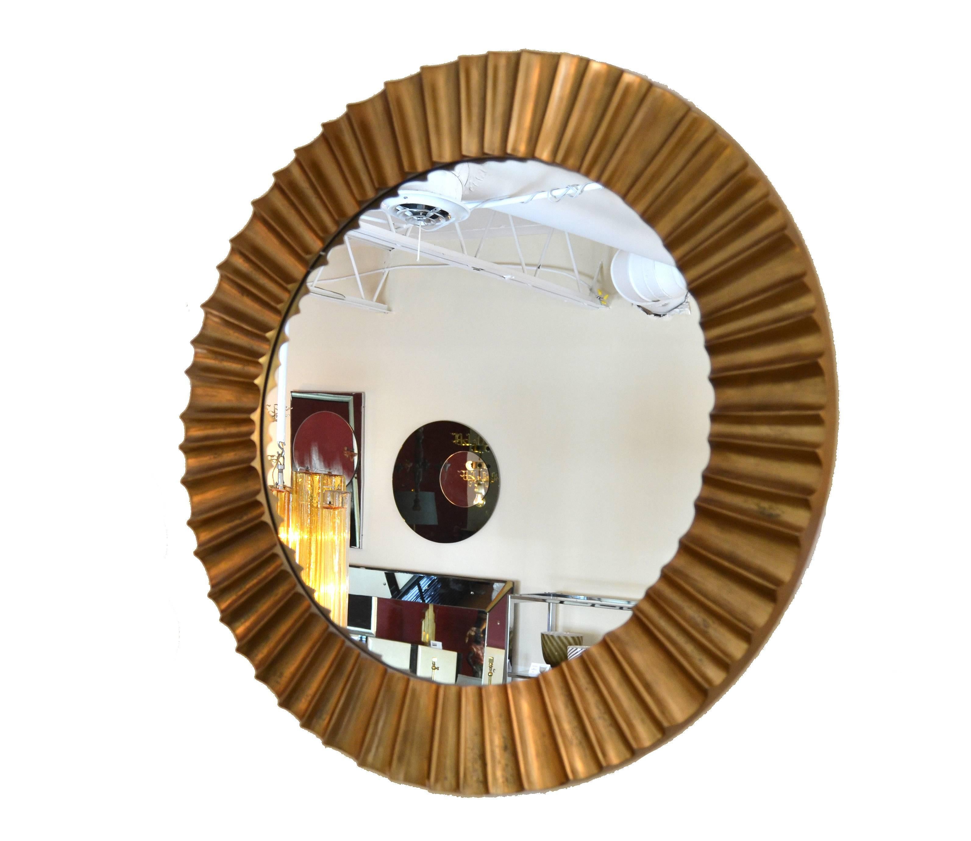 Large and heavy round solid bronze sunburst mirror.

 