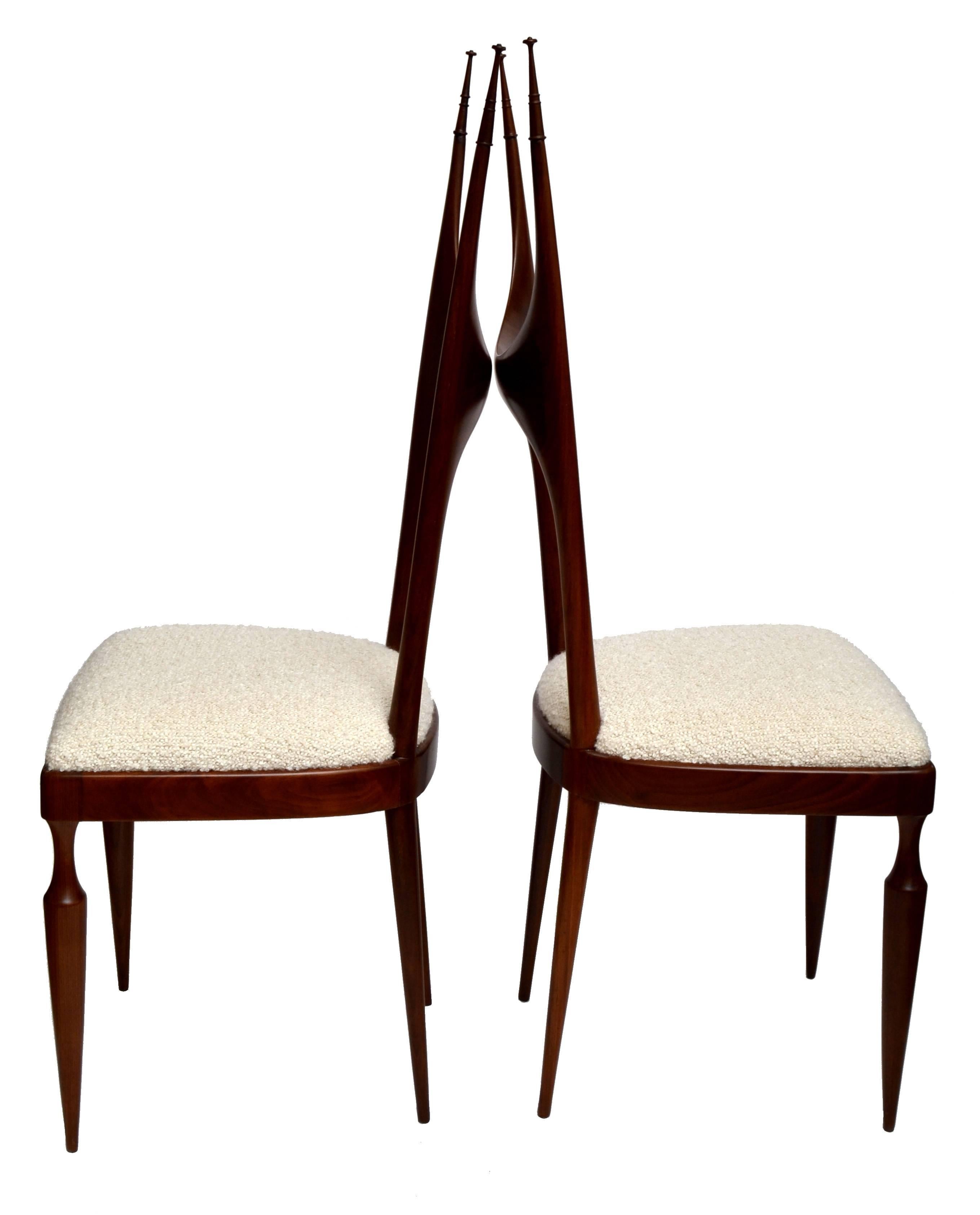 Unique Pozzi and Verga sculptural wooden chairs made in Italy, circa 1950.
The pair is new upholstered, firm and save to sit on.

         