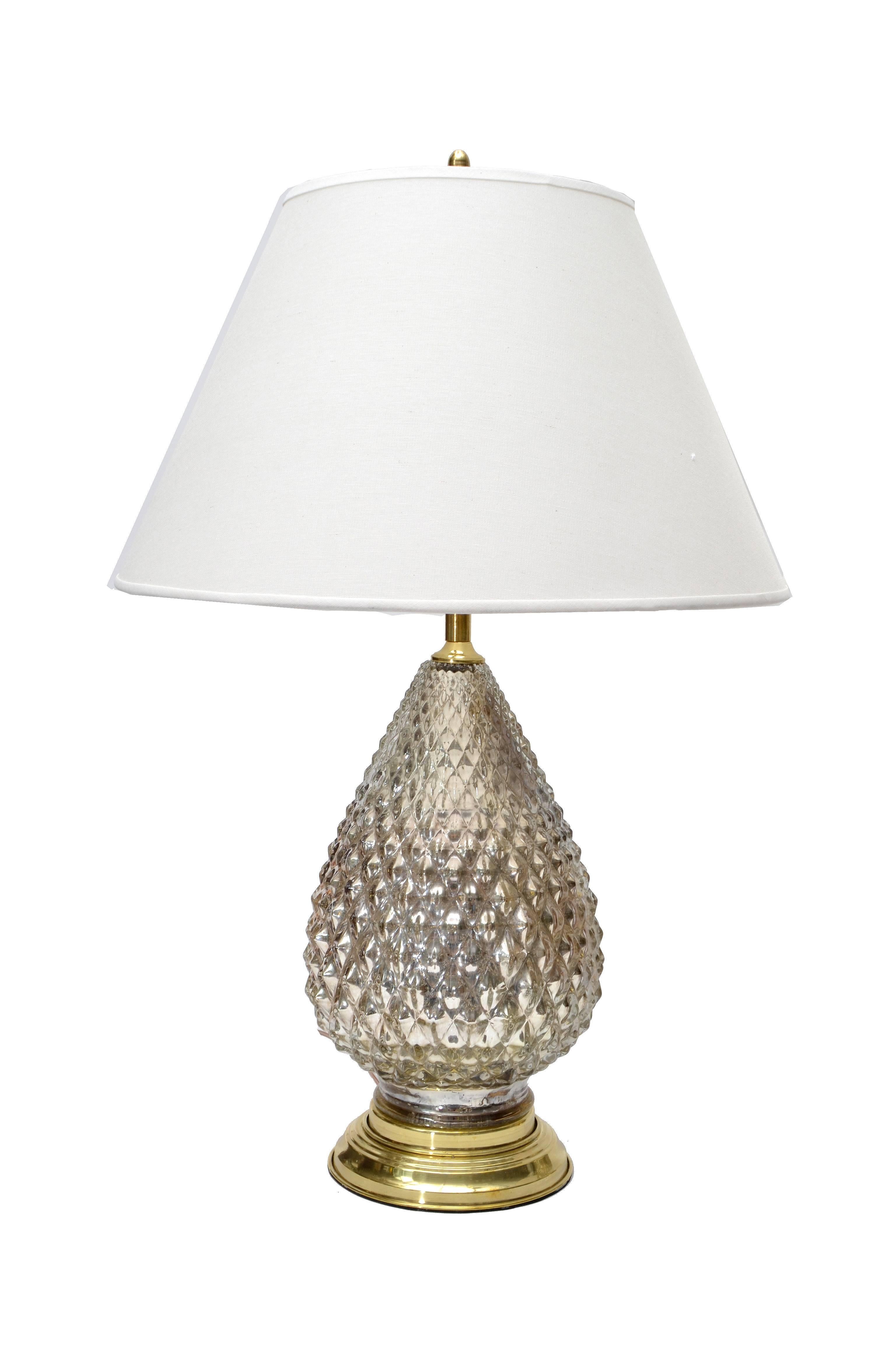 Pineapple pair of mercury glass lamps, with solid brass hardware. Double socketed and comes with Shades.
Each uses two regular 40 wattage light bulbs.
They come with a corded light switch.