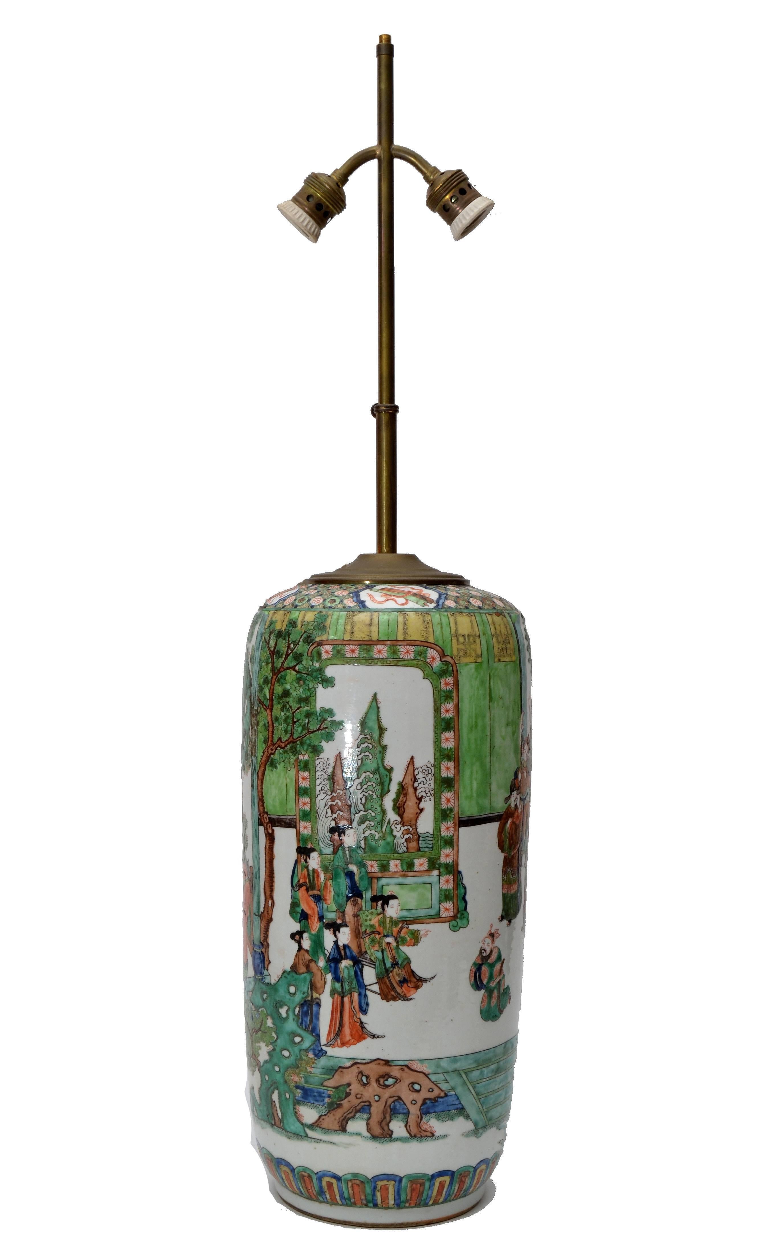 Antique Chinese porcelain table lamp hand-painted, which displays people in their daily life.
Brass shaft and double socketed.
Comes with the original shade and has a light switch.
Marked underneath.
  