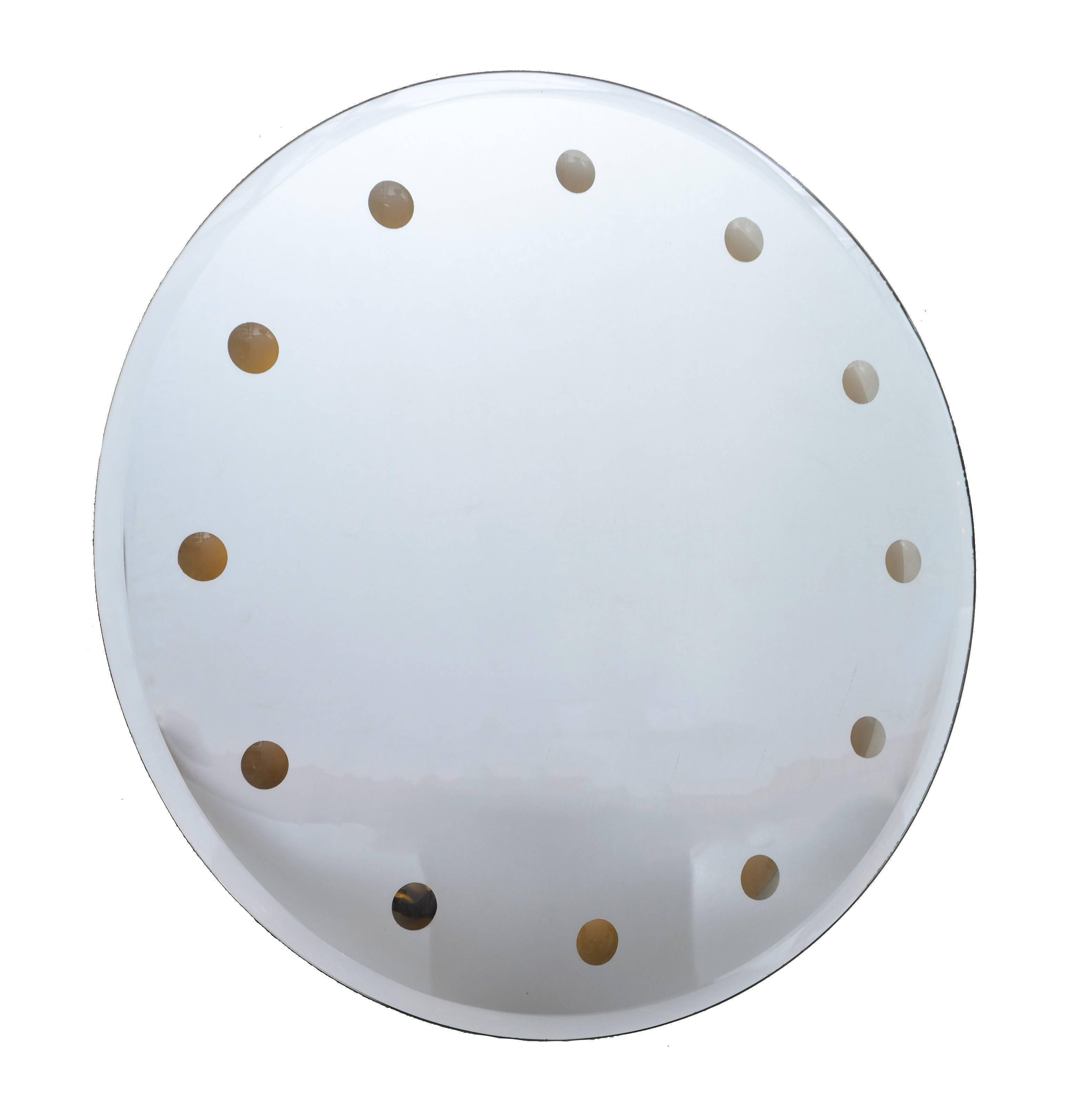Mid-Century Modern Venetian Round Dotted Glass Mirror which is backlit.
Fontana Arte Style and made in Italy in the late 1960s.
In perfect working condition and uses a circline.
  