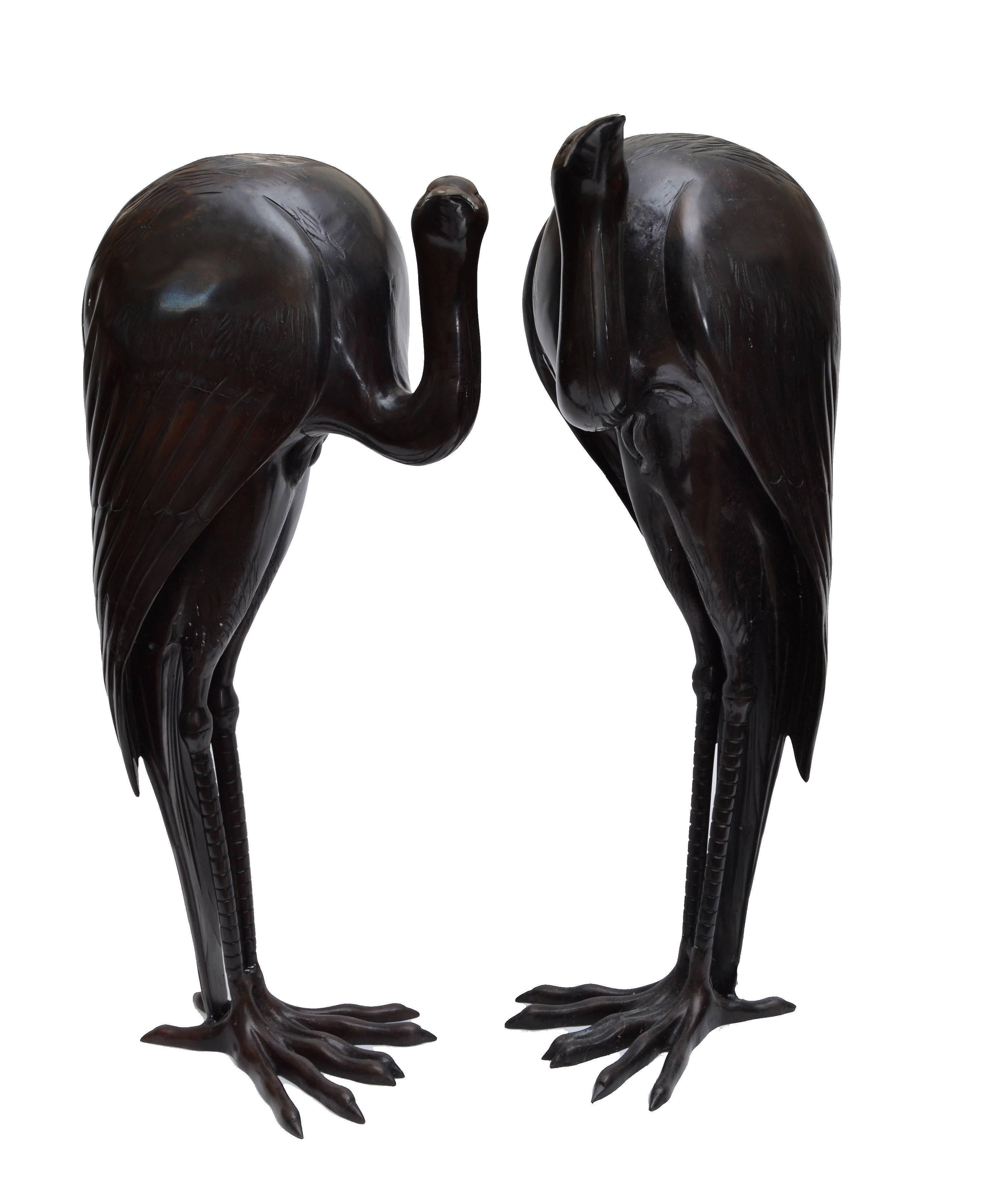 Solid bronze fountain heron sculptures, life-size, a pair.
Very detailed in the craftsmanship and heavy.
Dimension one head to the side:
Measure: Depth 13 inches, length 16.0 inches, height 28.0 inches.