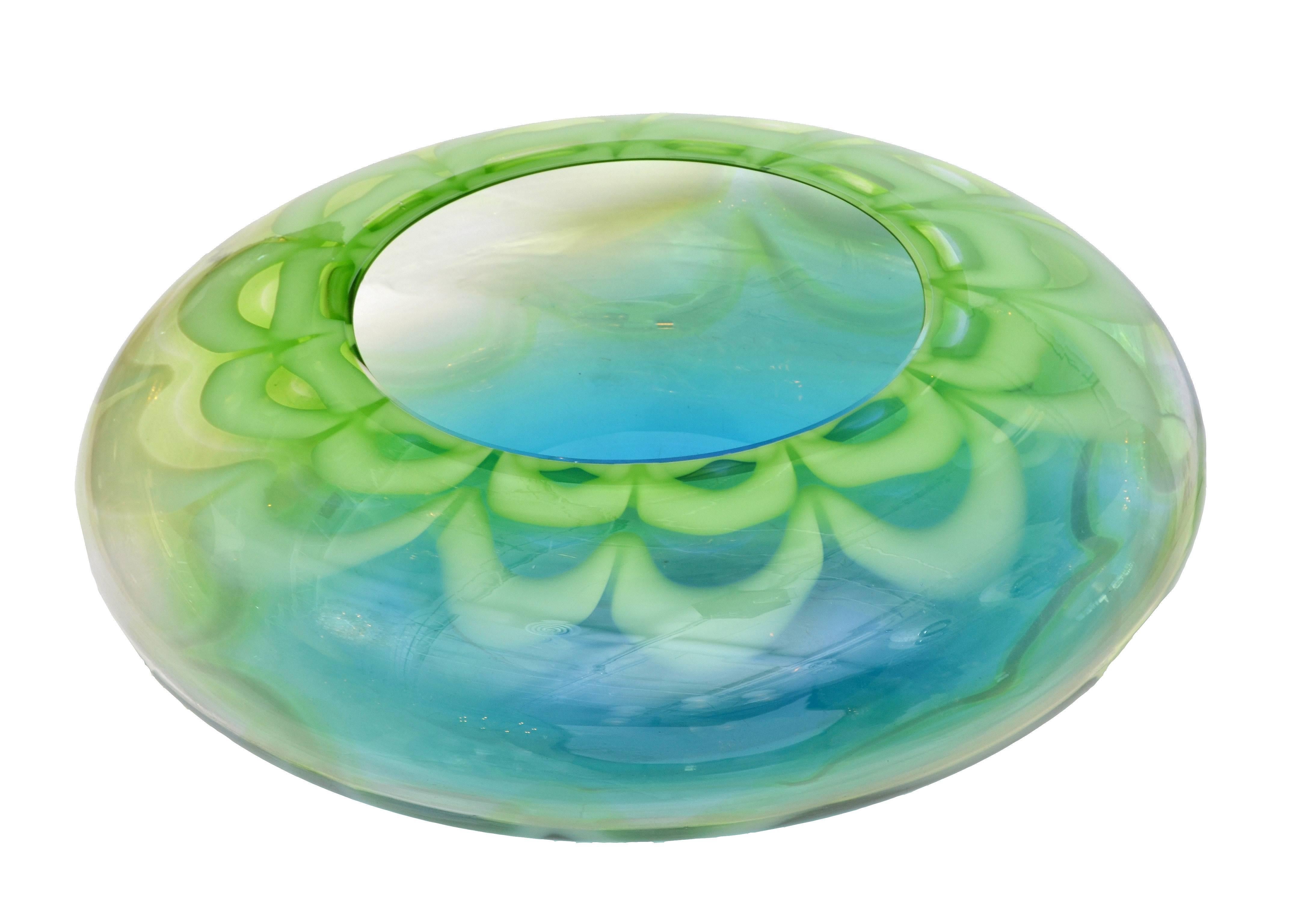 Beautiful art glass bowl or table vase in myriads of blue, white and green shades by Waterford Crystal.
Marked Evolution by Waterford.