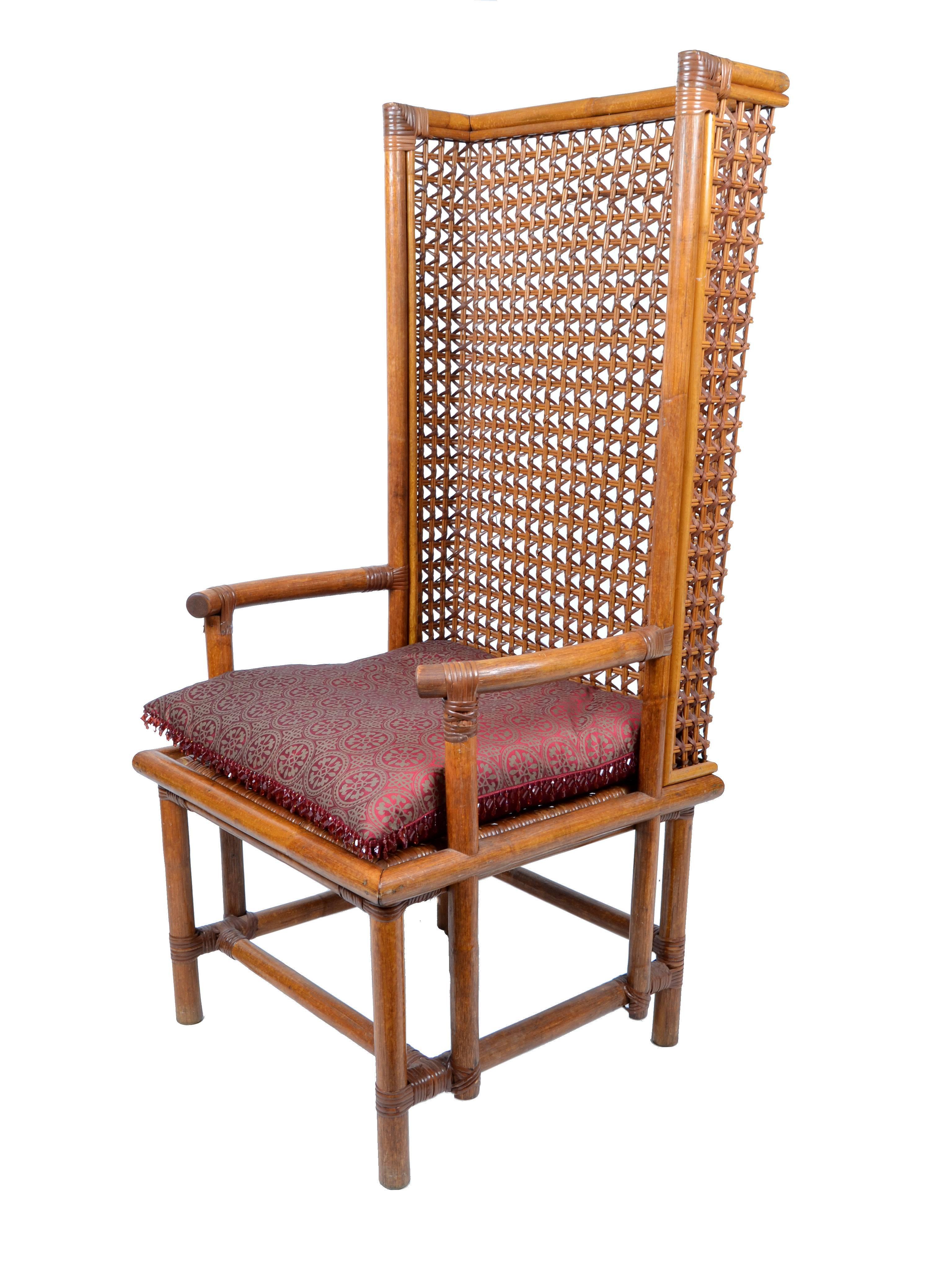 Vintage bamboo and cane Chinese Chippendale style high back chair.
Comes with a seat cushion.


Dimension:
Seat height 20 inches
Arm height 26 inches.