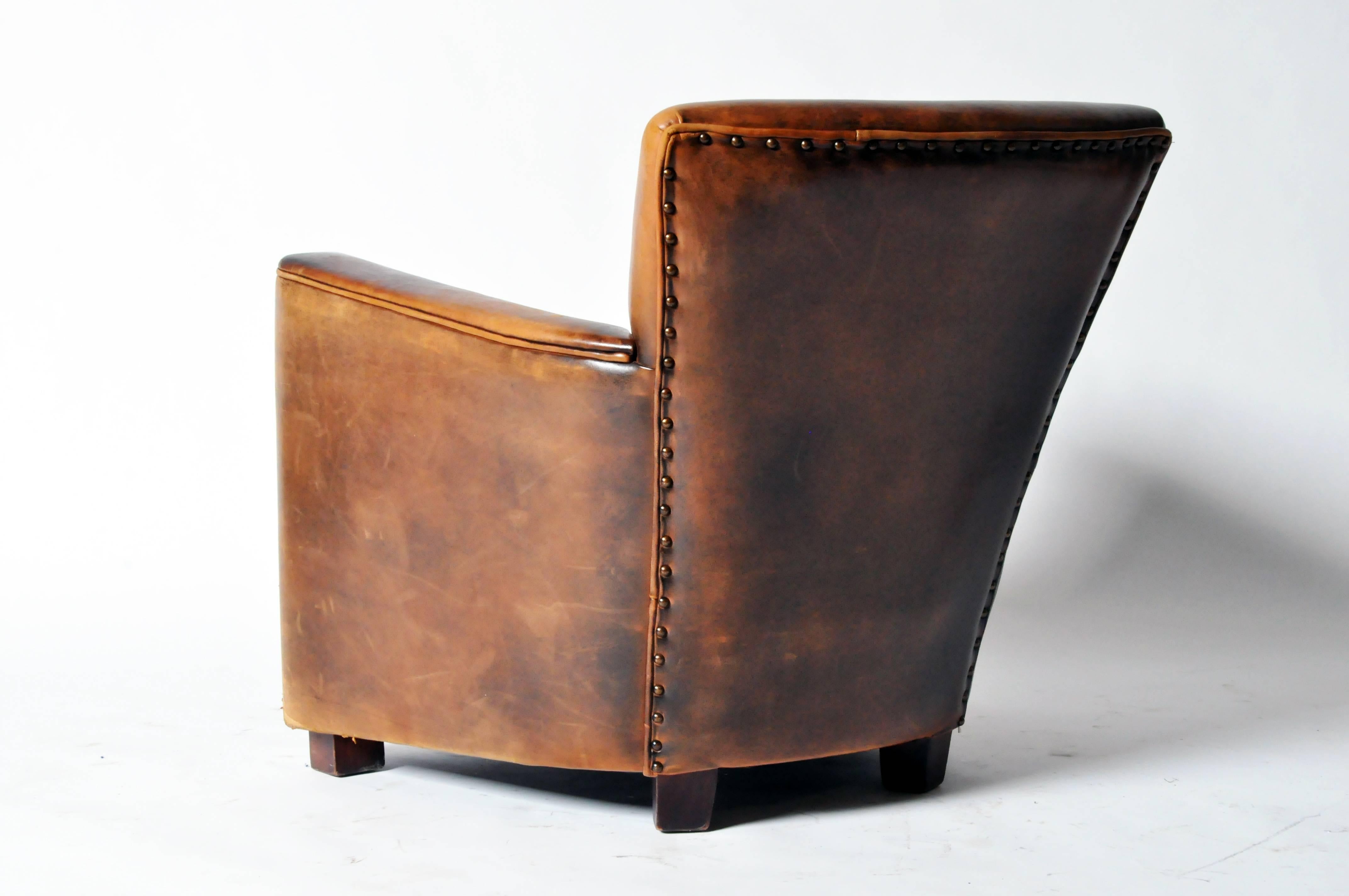 distressed leather club chairs