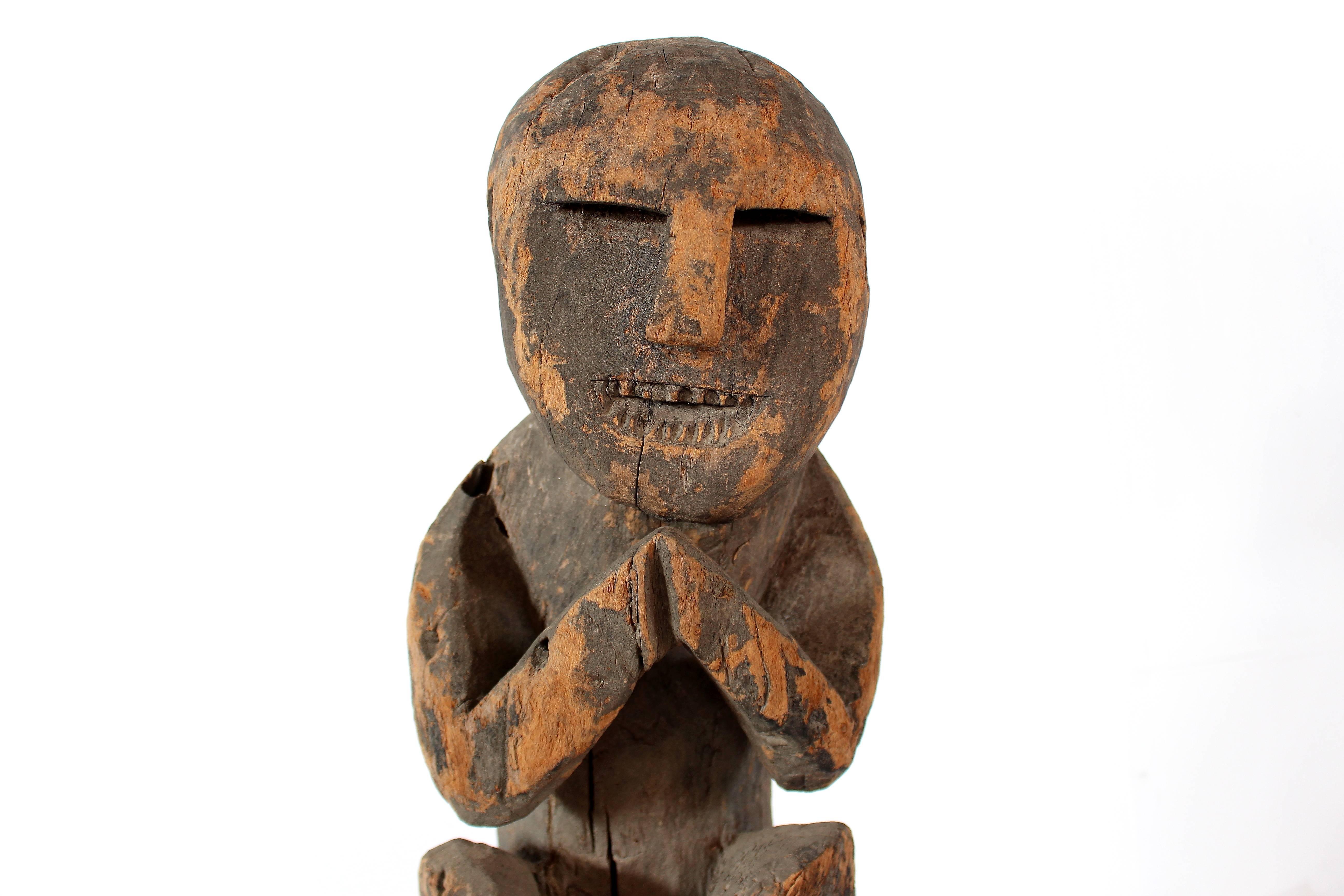 Tribal Naga Effigy Carving of a Squatting Man