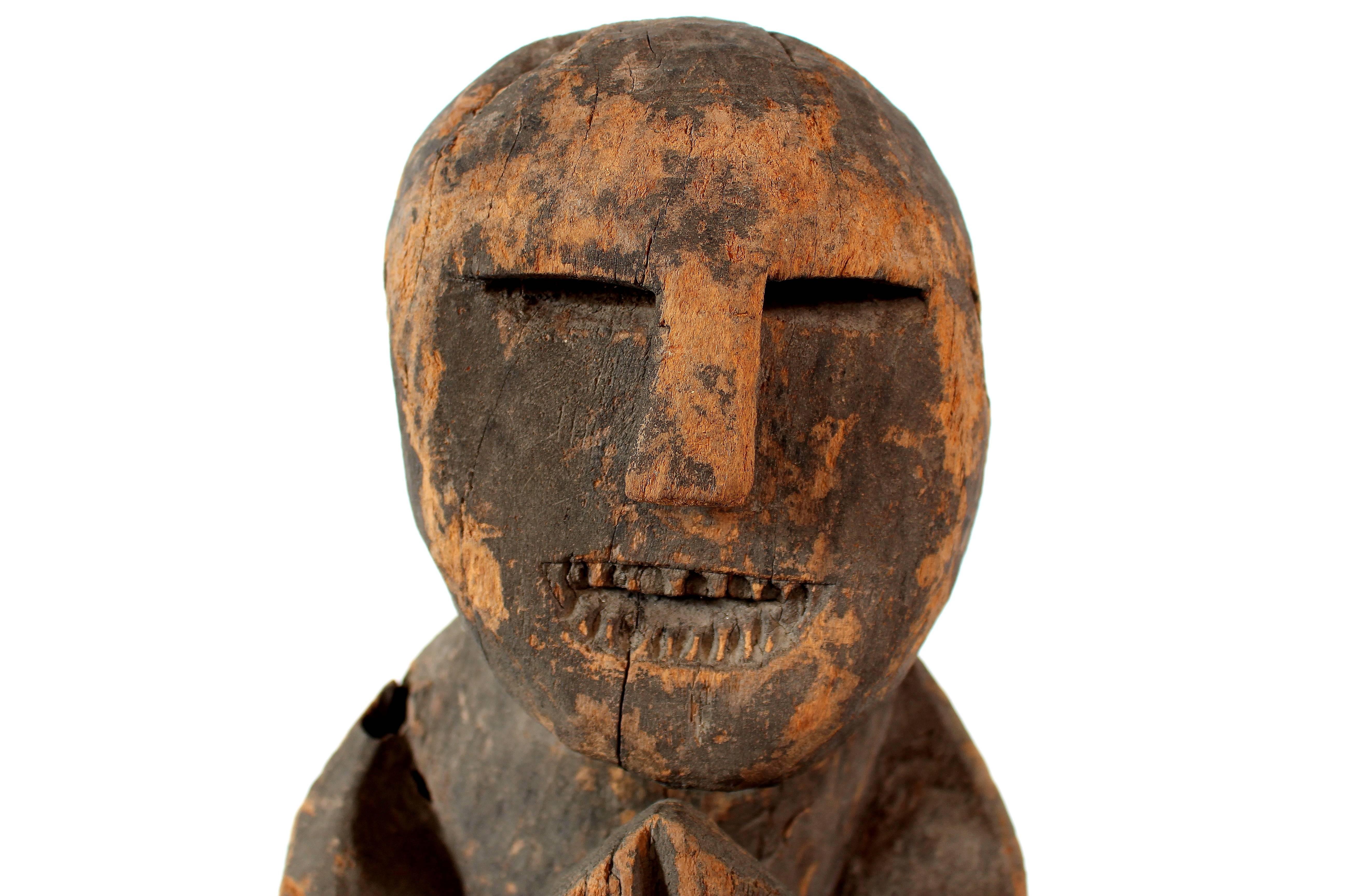 Hand-Carved Naga Effigy Carving of a Squatting Man