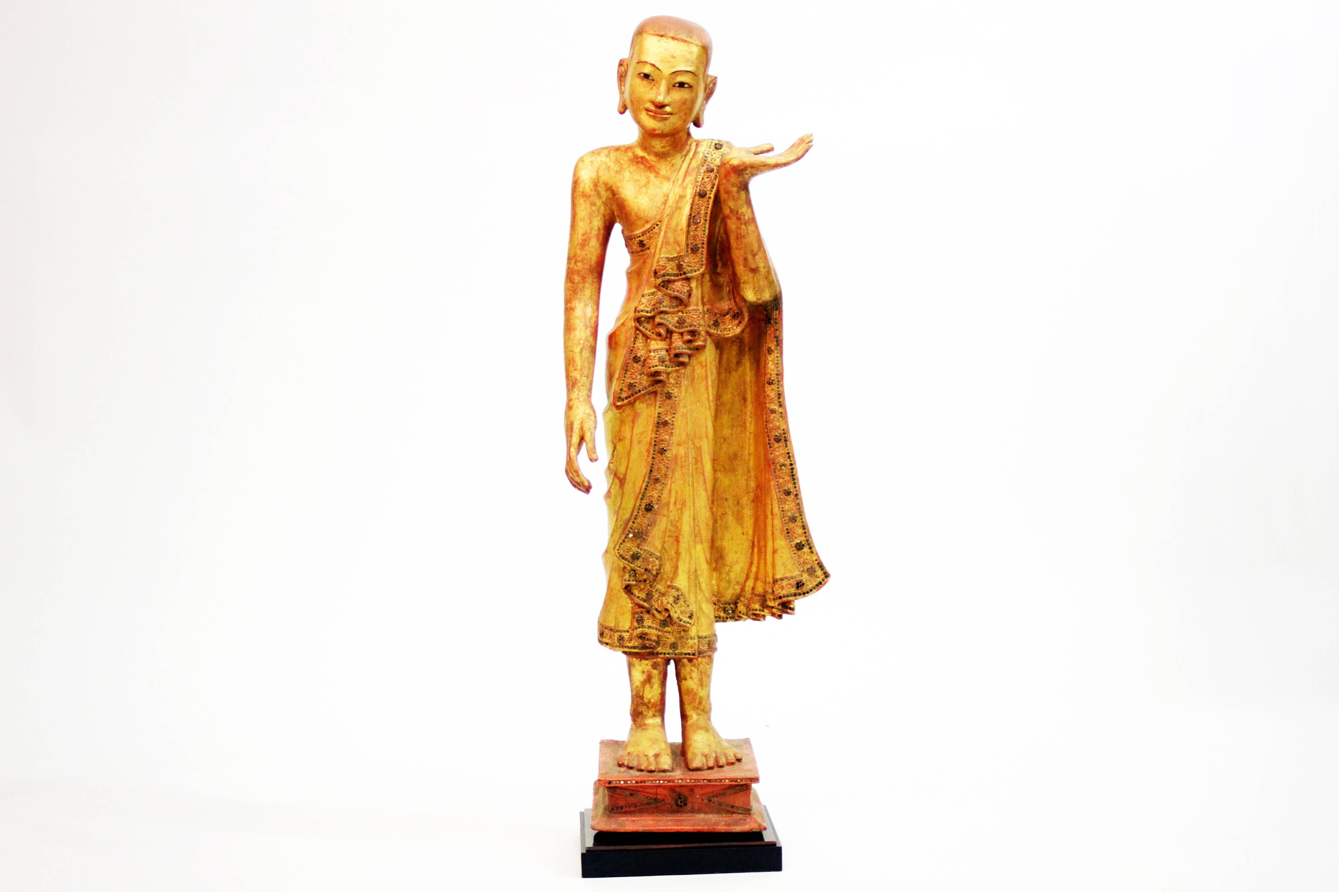This impressive hand-carved Burmese Apostle is from Rangoon, Myanmar early 19th century and is made from gold leaf and lacquer over teakwood.