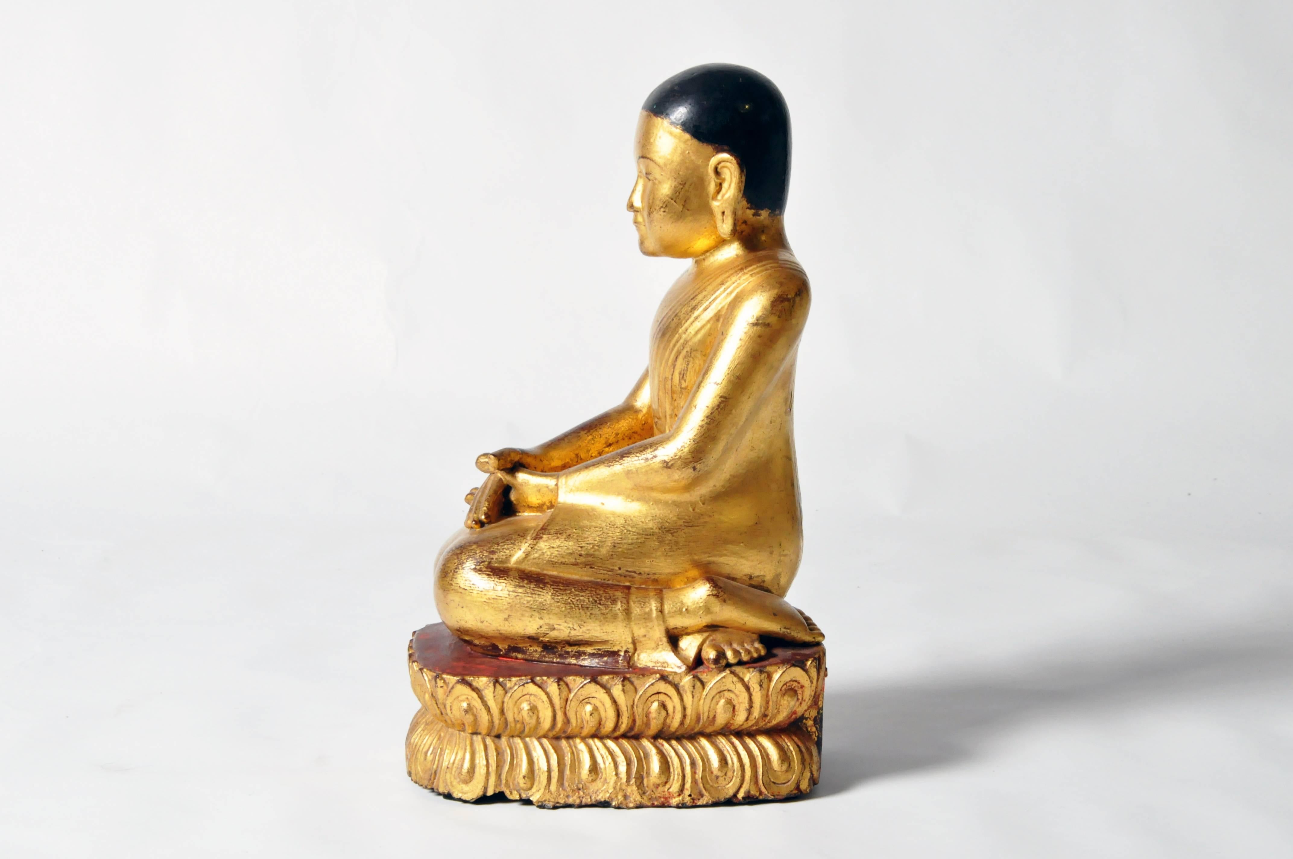 Lacquered Pair of Giltwood Buddhist Apostles For Sale