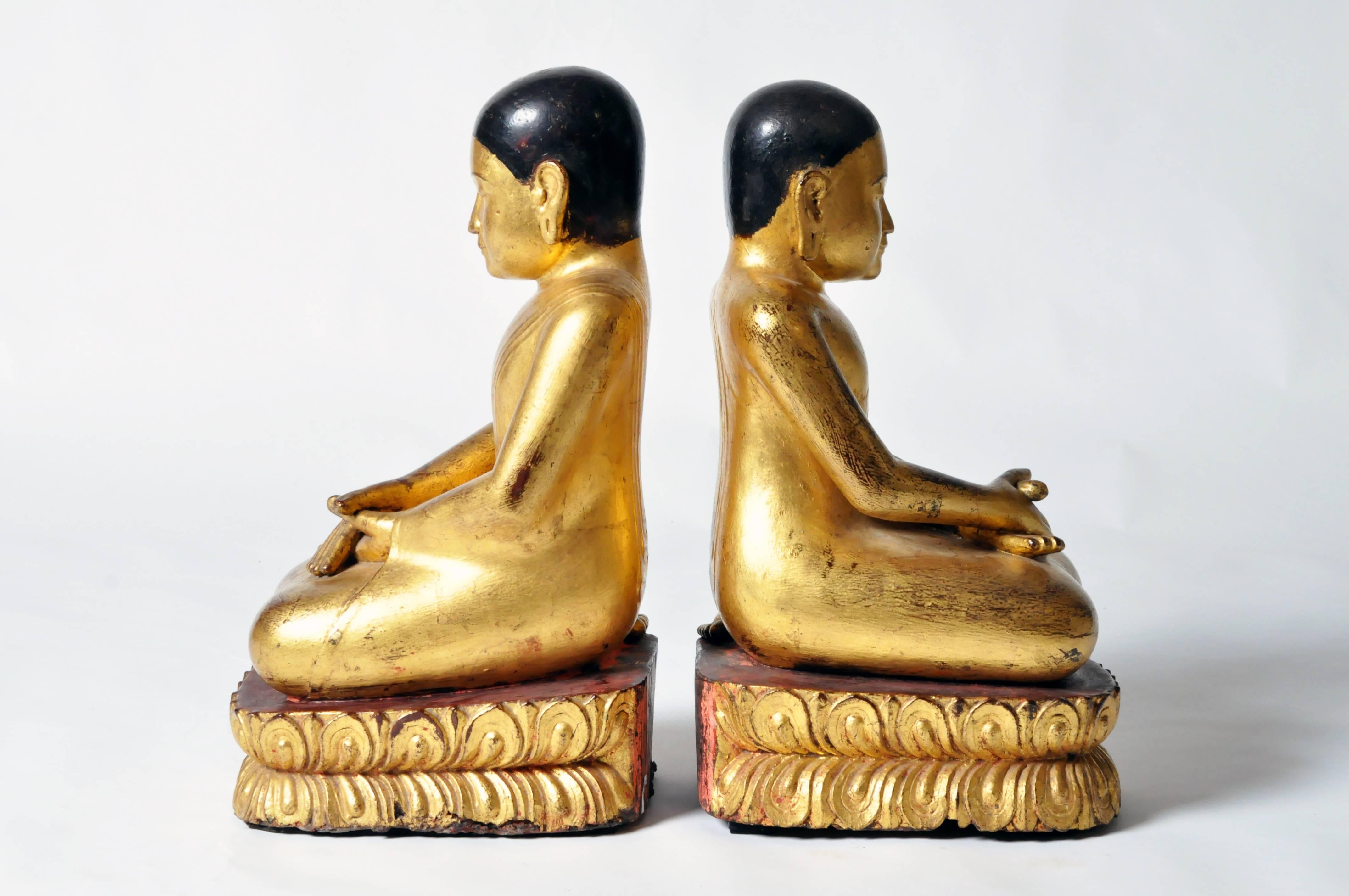 According to Buddhist tradition, the Buddha had two first Chief Disciples, Sāriputta and Moggallāna. Depictions of these apostles are often found along side Buddha statues on temple altars.

Both apostles are depicted in a worshipful pose, their
