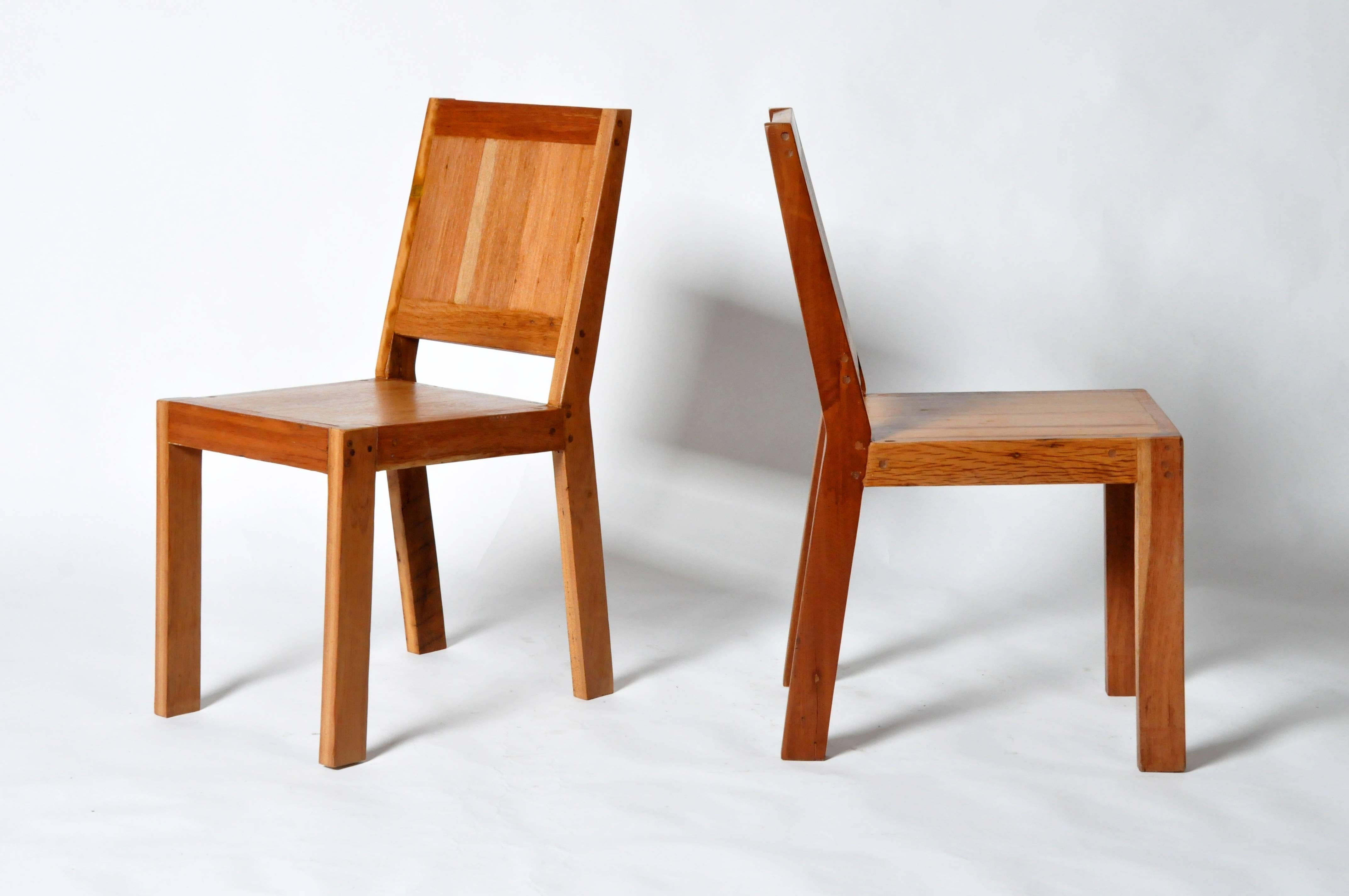 These custom designed chairs were designed our Atelier and made from reclaimed teak wood. They are comfortable and sturdy chairs with clean lines.
