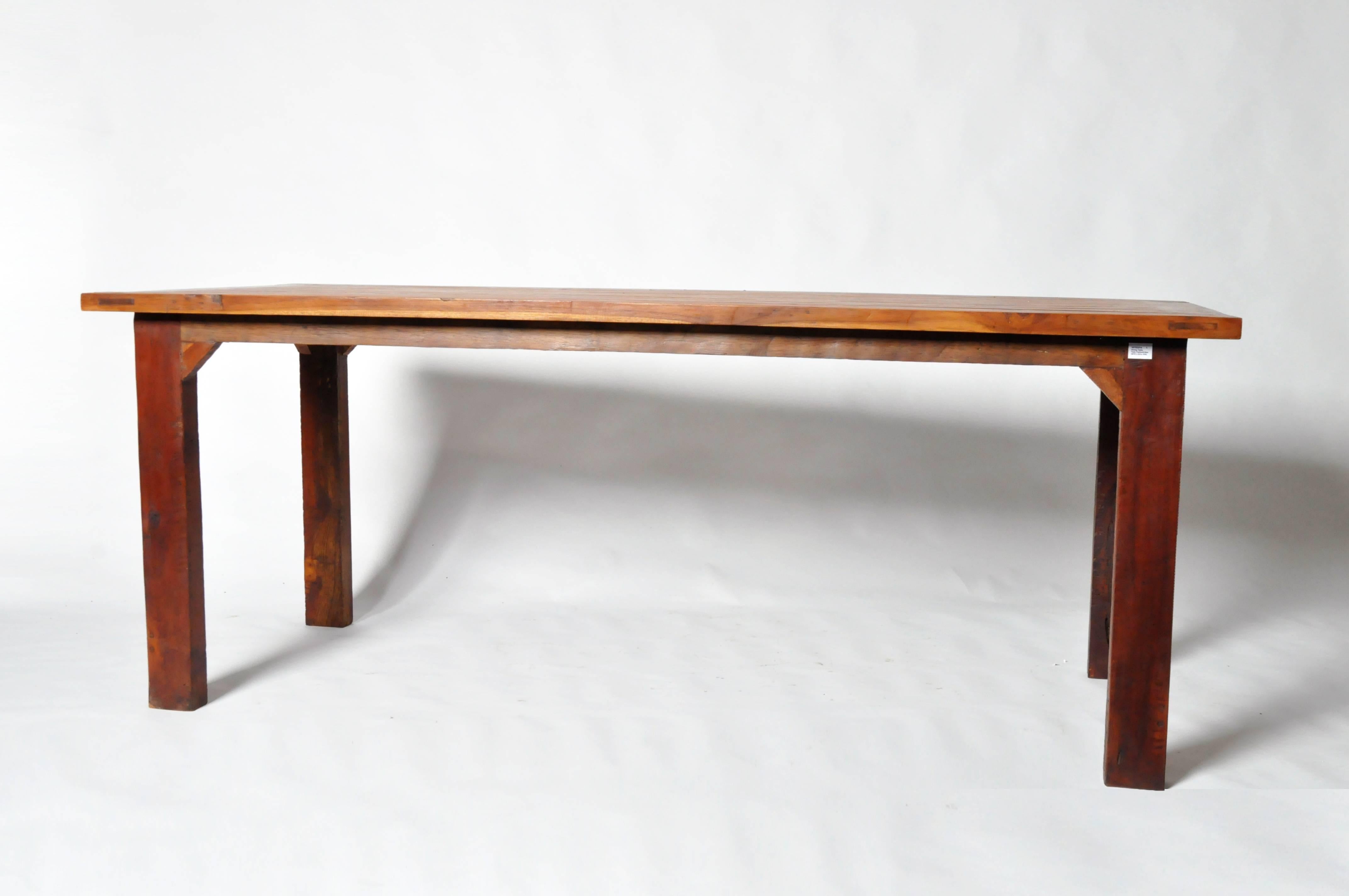 This table was made from reclaimed teakwood and is from Thailand. It can be used as a dining table or conference table.