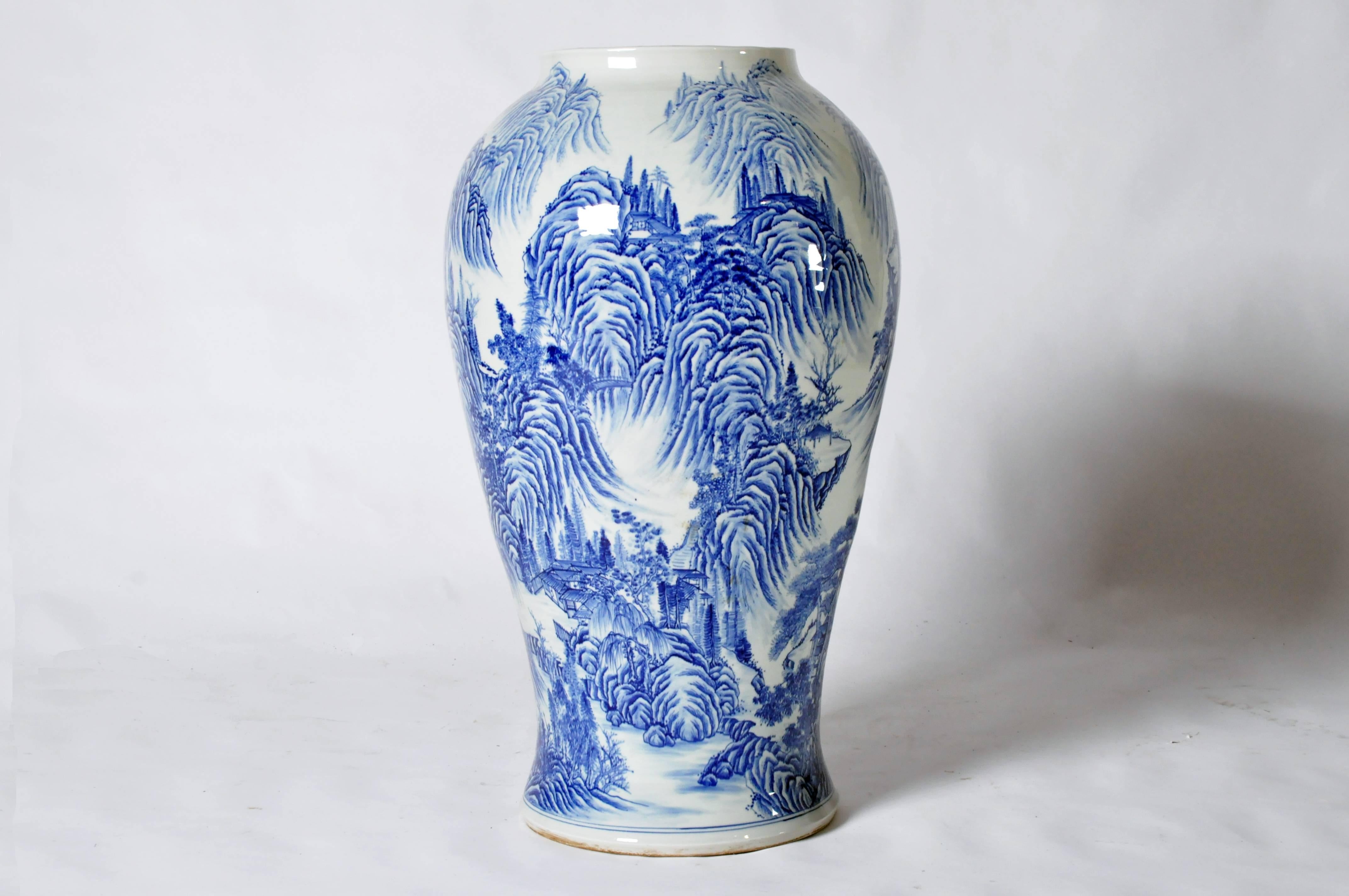 This impressive blue and white ceramic vase is from Japan, circa 1950.
