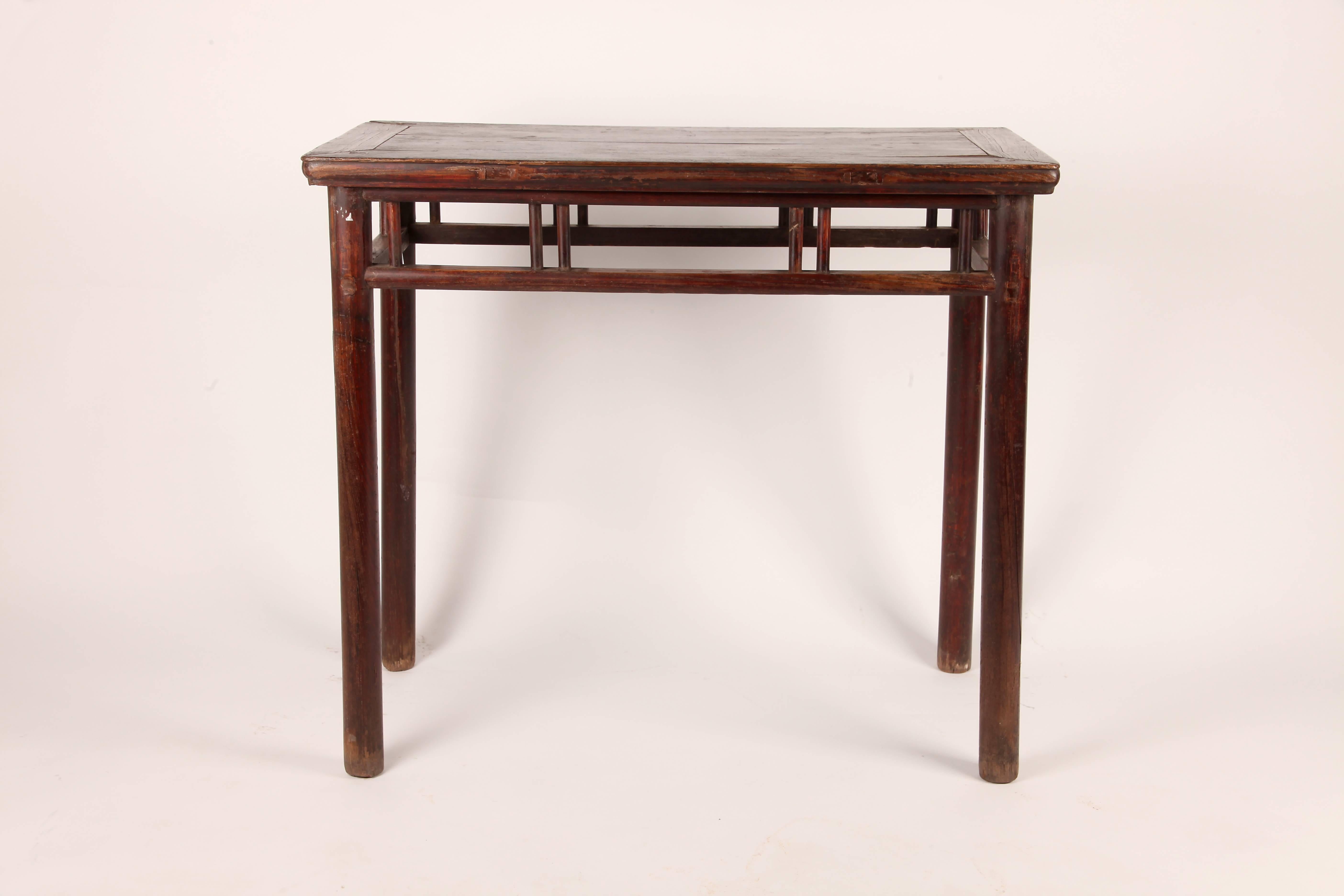 These Chinese wine tables are made from elmwood circa 1850 and can also function as a bench as well.