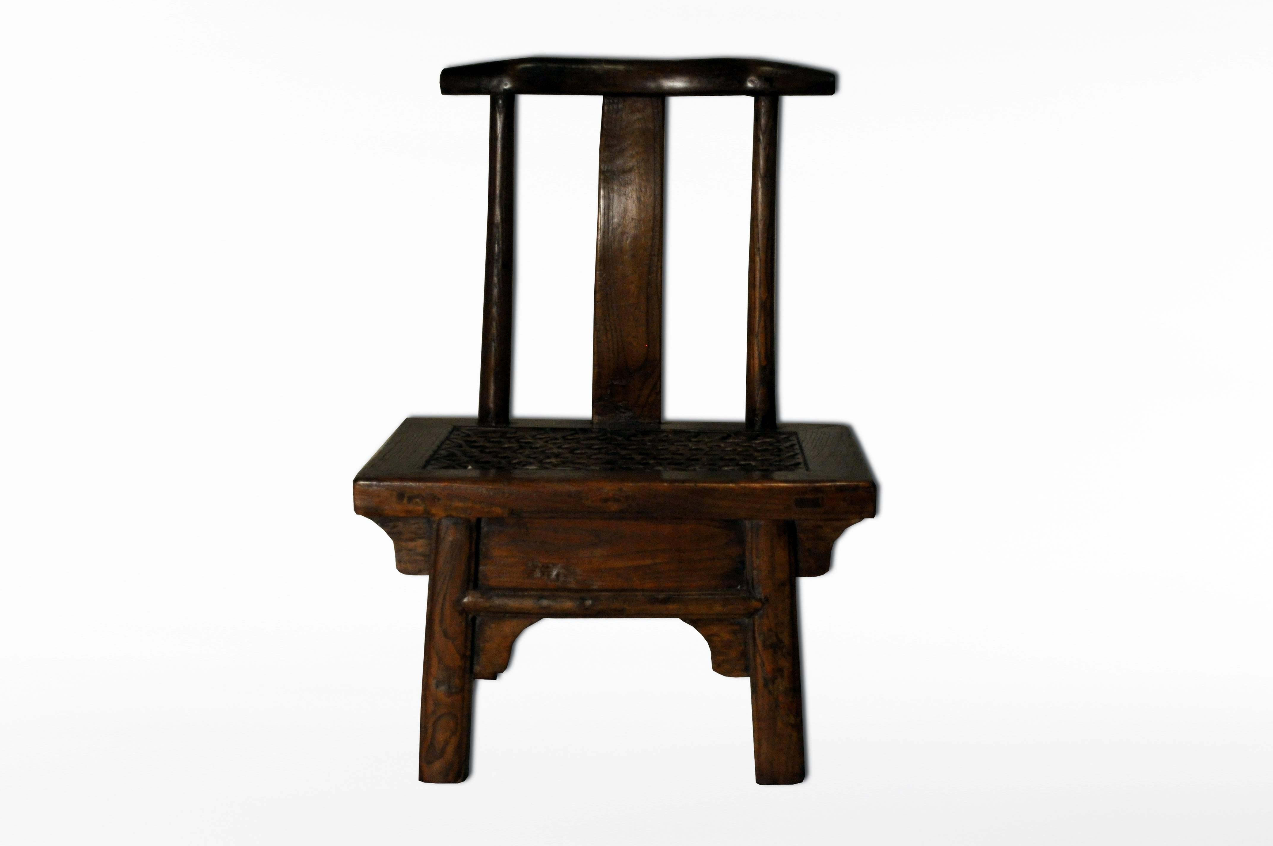 This Chinese side chair is from Henan, China and is made from Yang wood and leather.