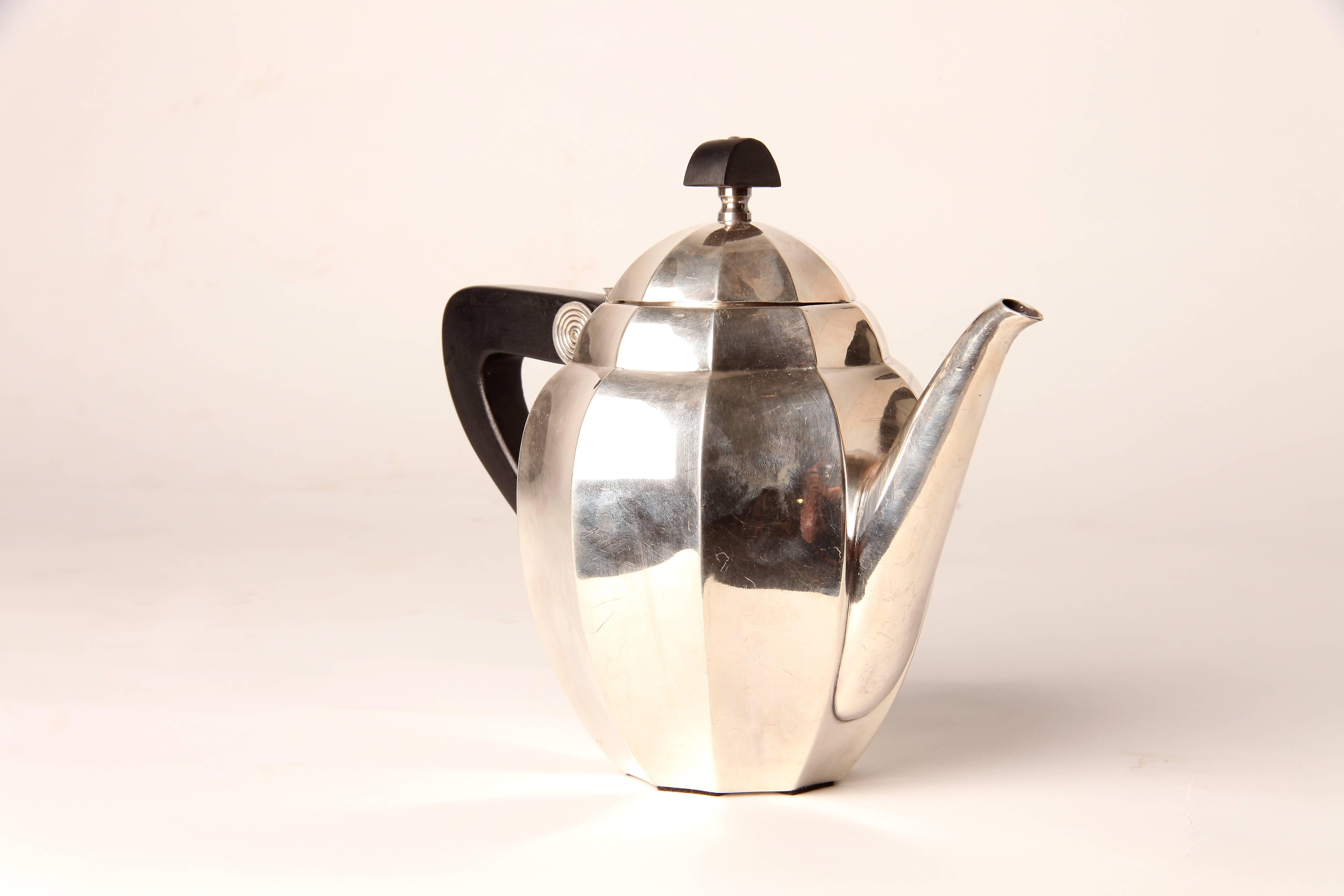 This silver plated tea pot is from France and is by Maurice Du Fresne, circa 1920.