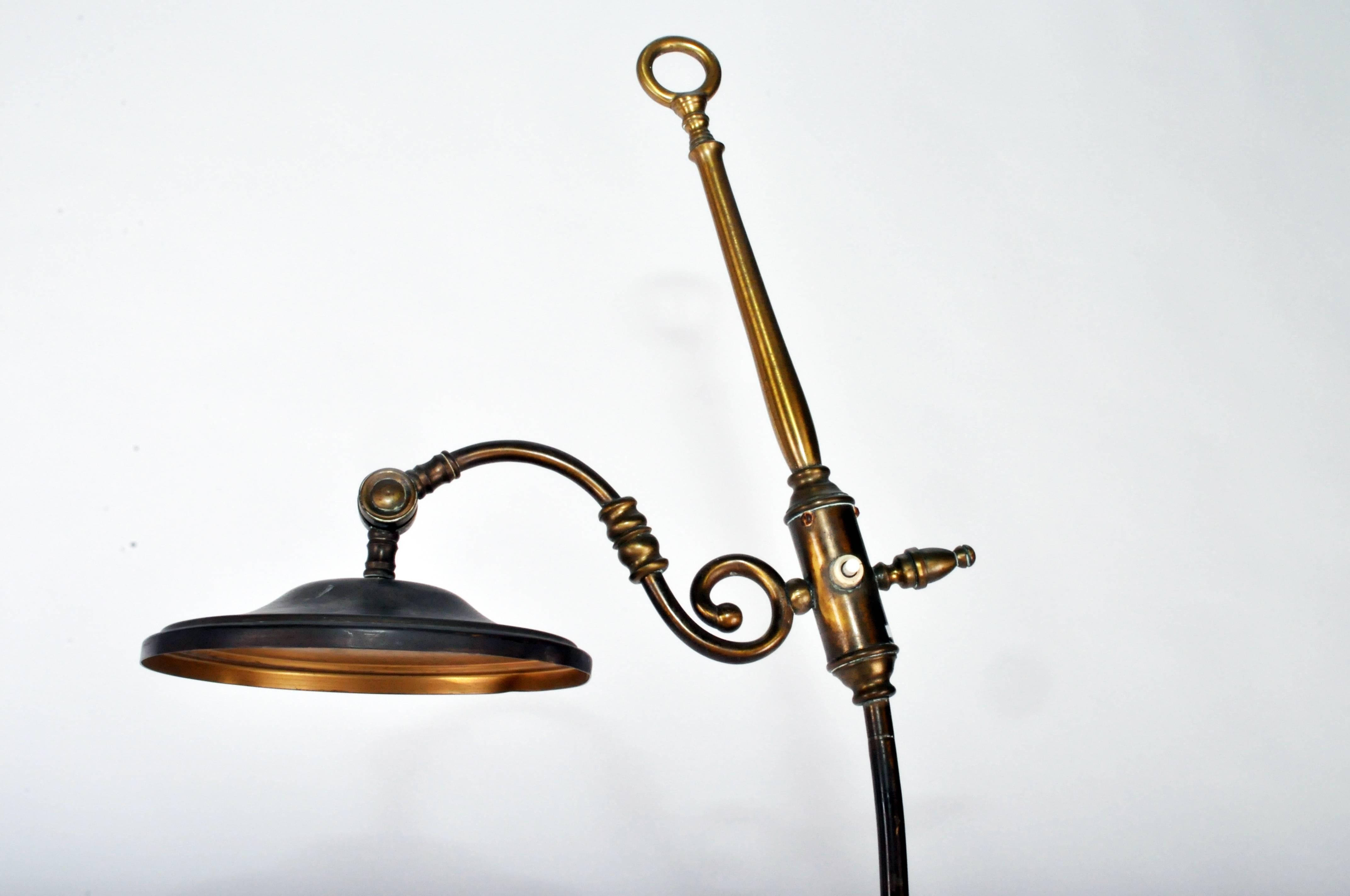 This vintage brass floor lamp is from France, circa 1900.