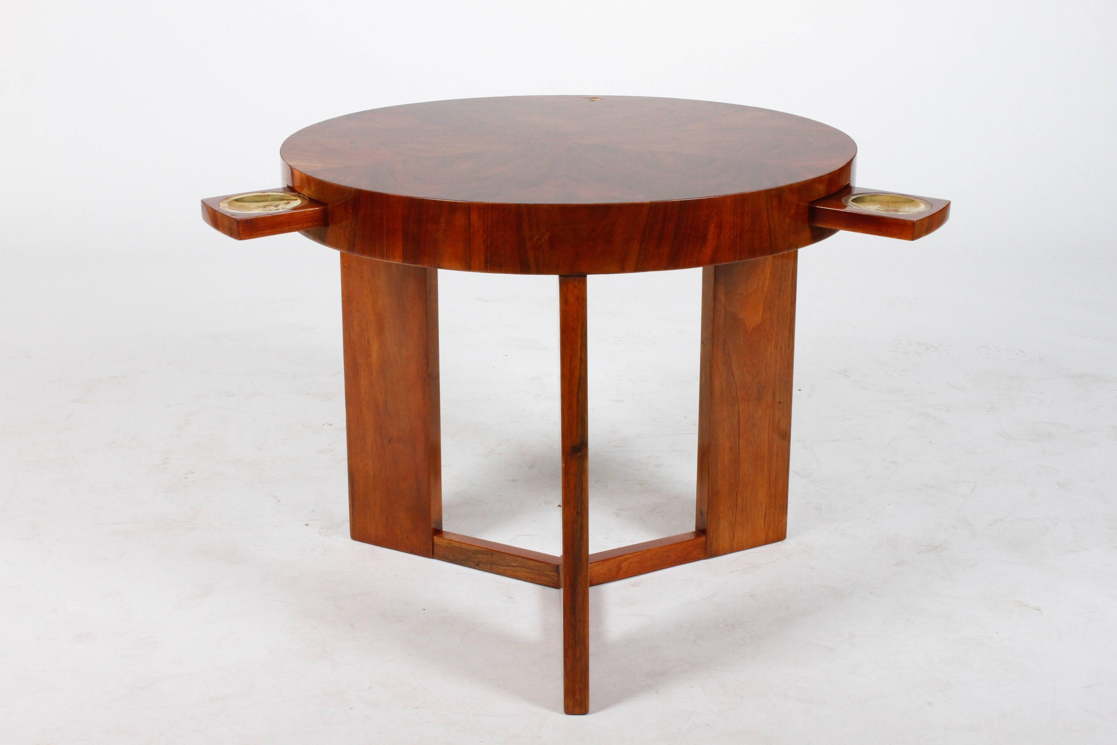 This Art Deco game table is from Hungary, circa 1930. It is made from walnut veneer and has three extendable ashtrays.